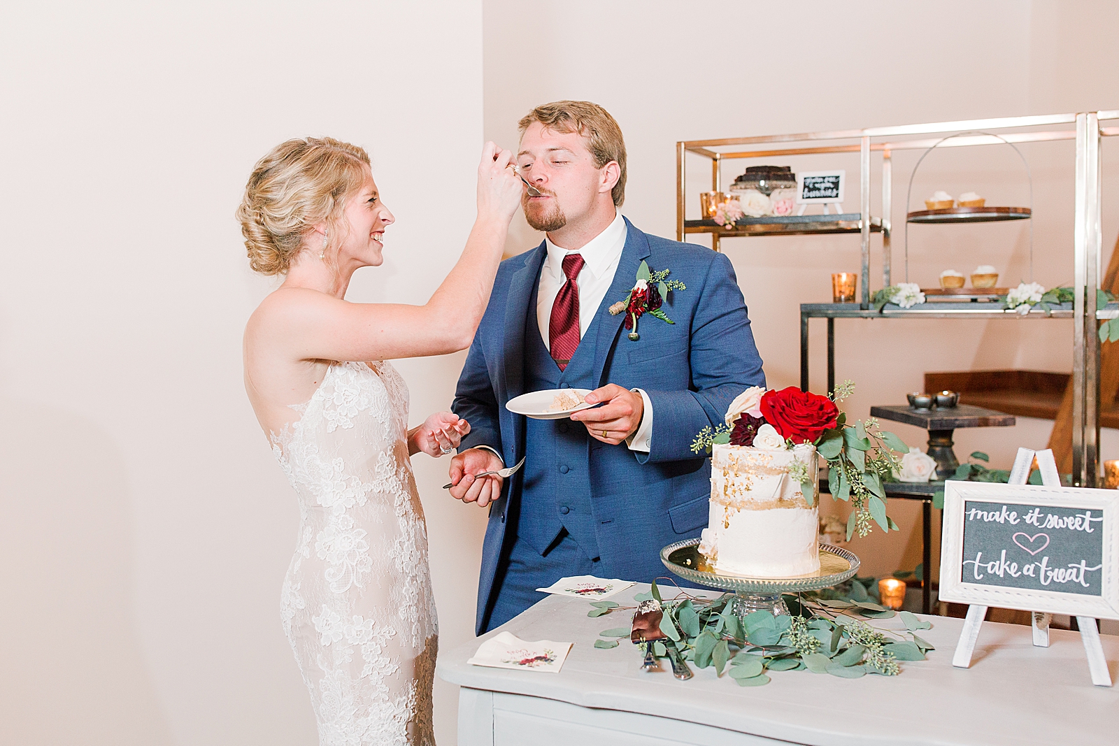 Winmock Wedding Bride and Groom Sharing Cake Photo