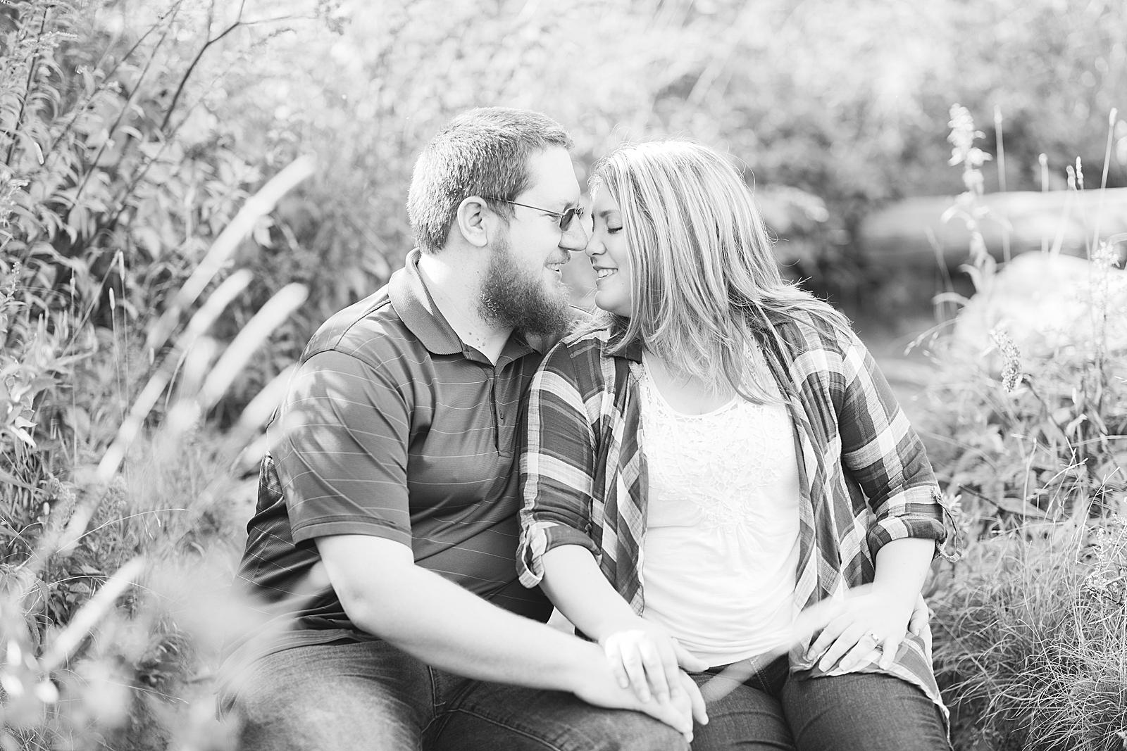 Blue Ridge Parkway Engagement Black and White of Couple sitting nose to nose Photo