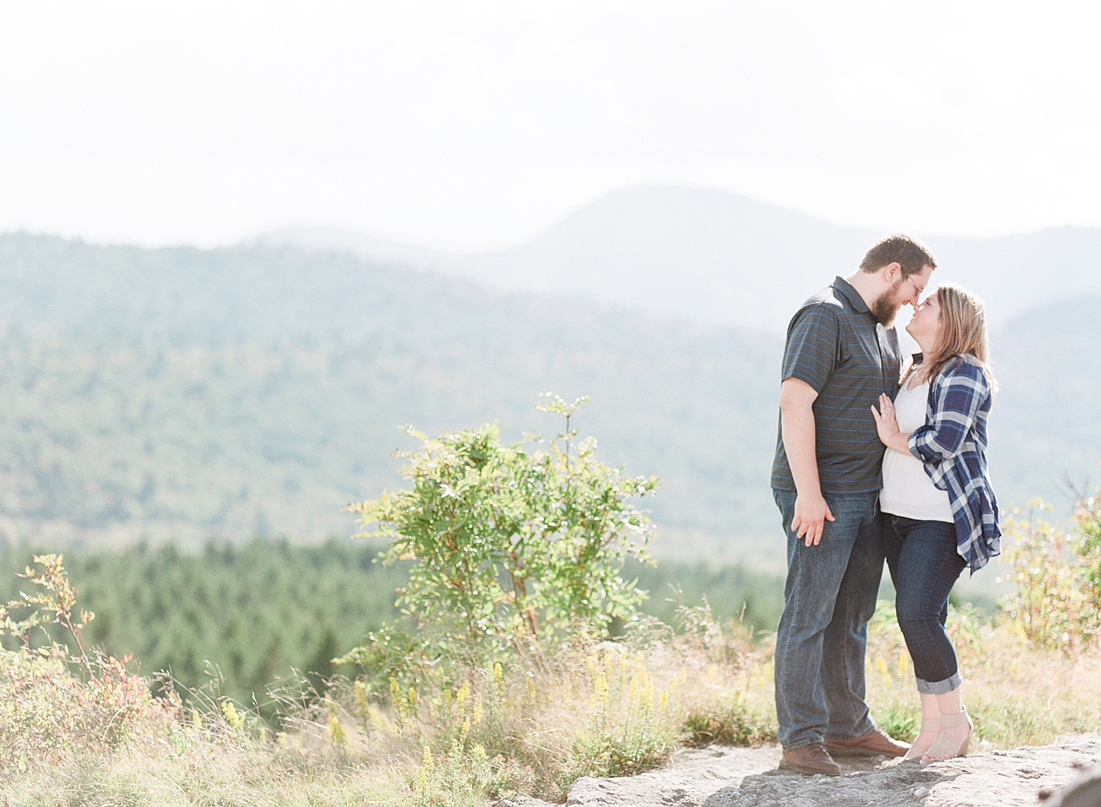 Blue Ridge Parkway Engagement Couple Smiling nose to nose Photo