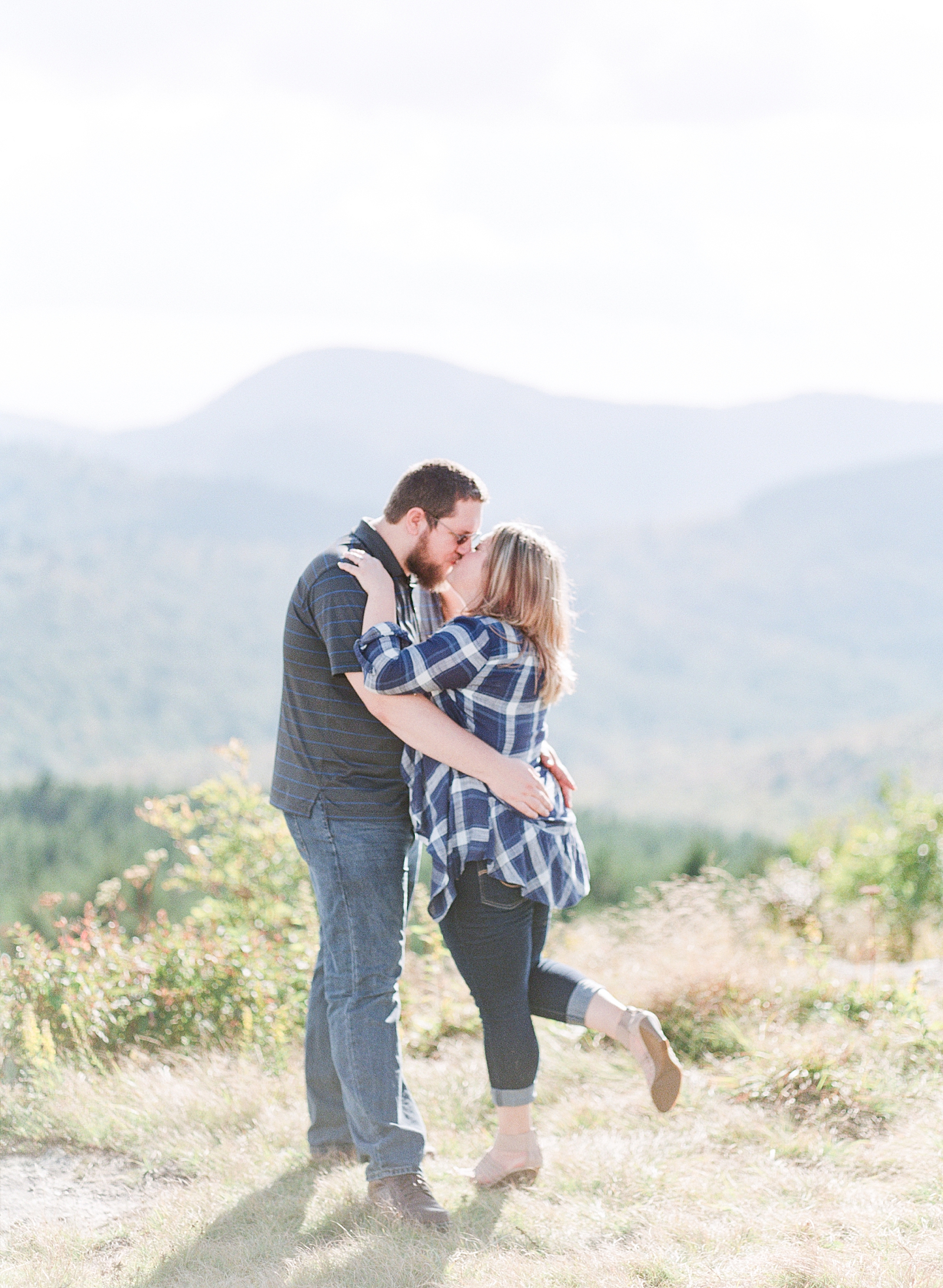 Blue Ridge Parkway Engagement Couple Kissing Photo