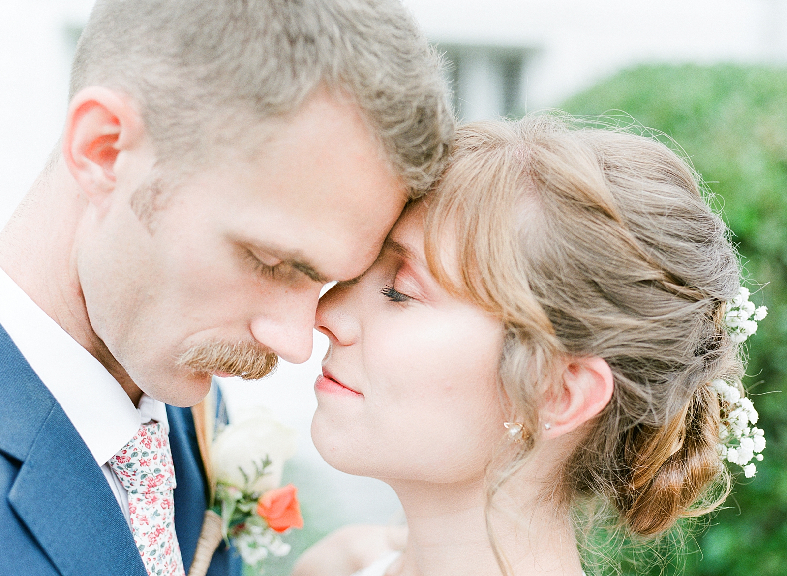 Dairy Barn Wedding Bride and Groom Snuggling Nose to Nose Photo