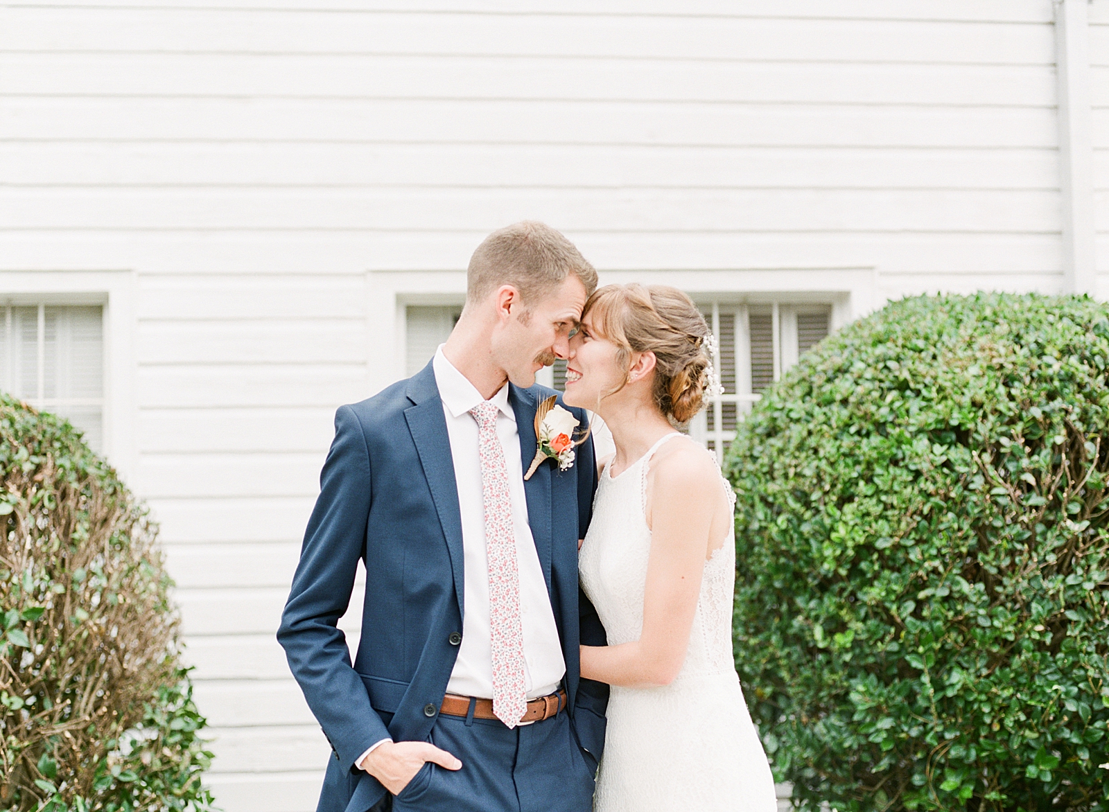Dairy Barn Wedding Bride and Groom smiling and hugging Photo