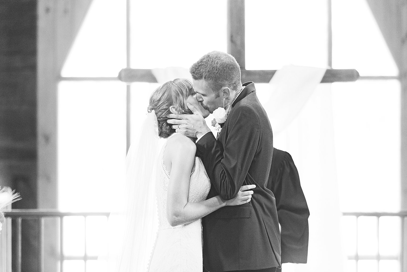 Dairy Barn Wedding Ceremony Black and White First Kiss Photo