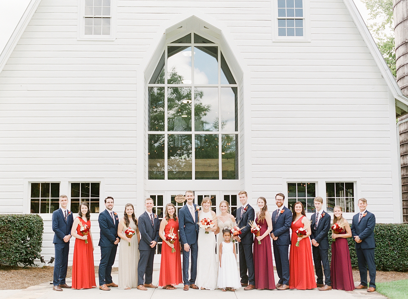 Dairy Barn Wedding Bridal Party in Front of Venue Photo