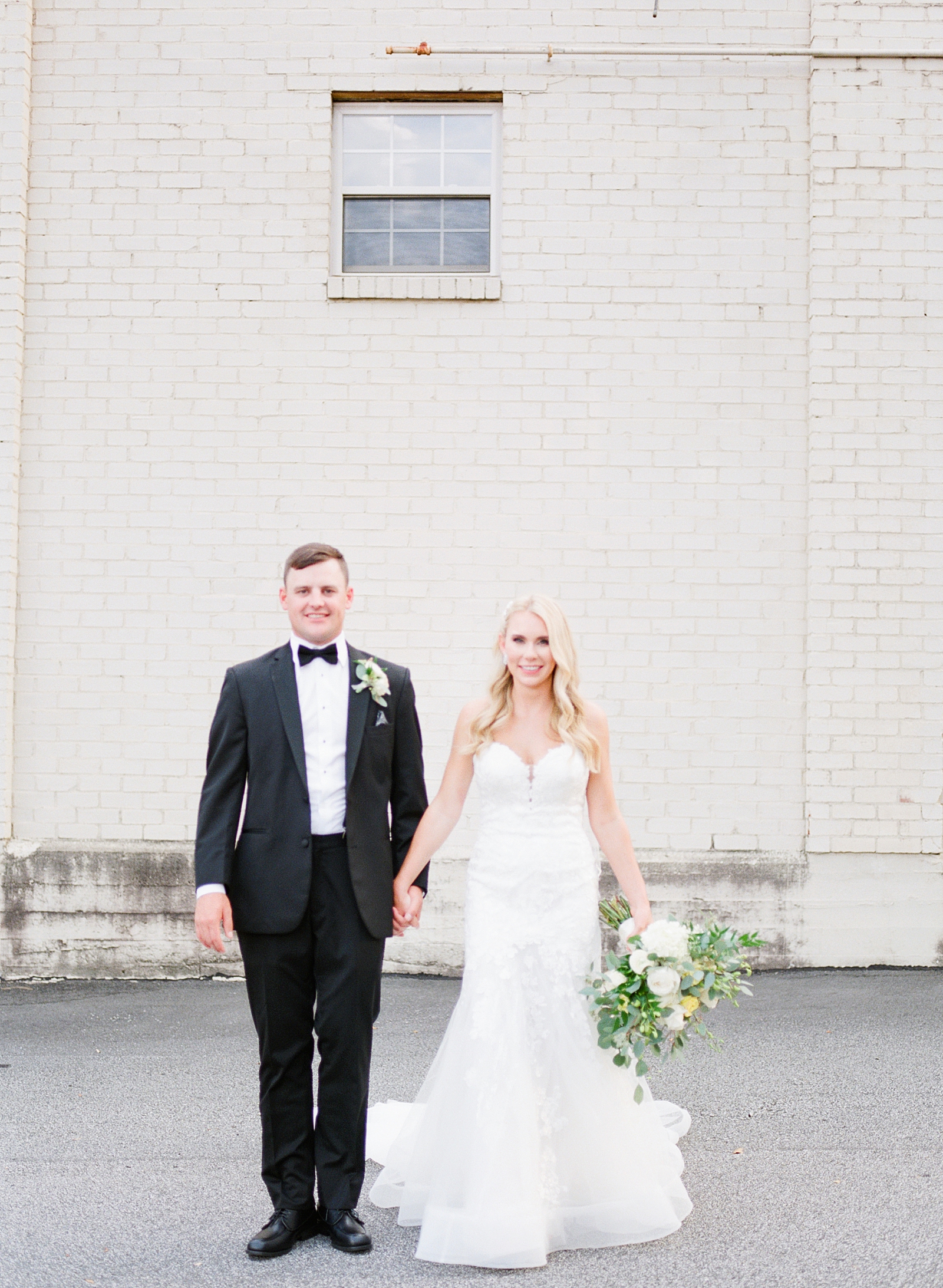 Glover Park Brewery Wedding Bride and Groom Holding Hands Smiling at Camera Photo