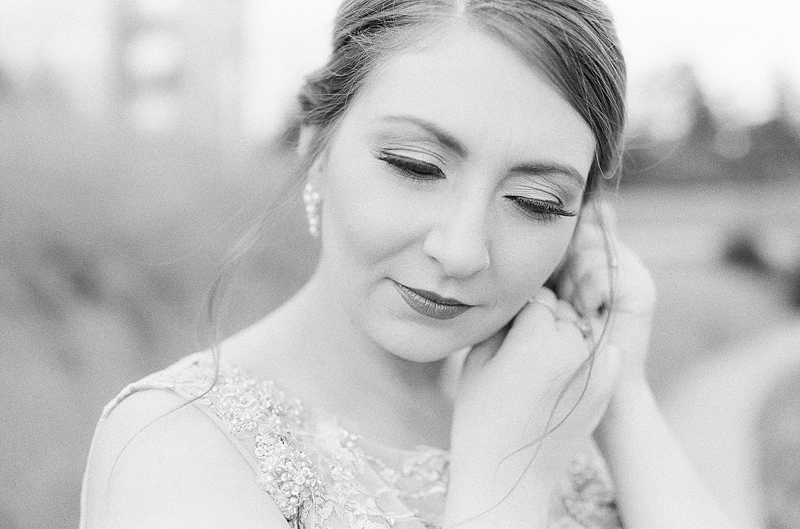 Asheville Bridal Editorial Black and White of Bride Putting on Earrings Photo
