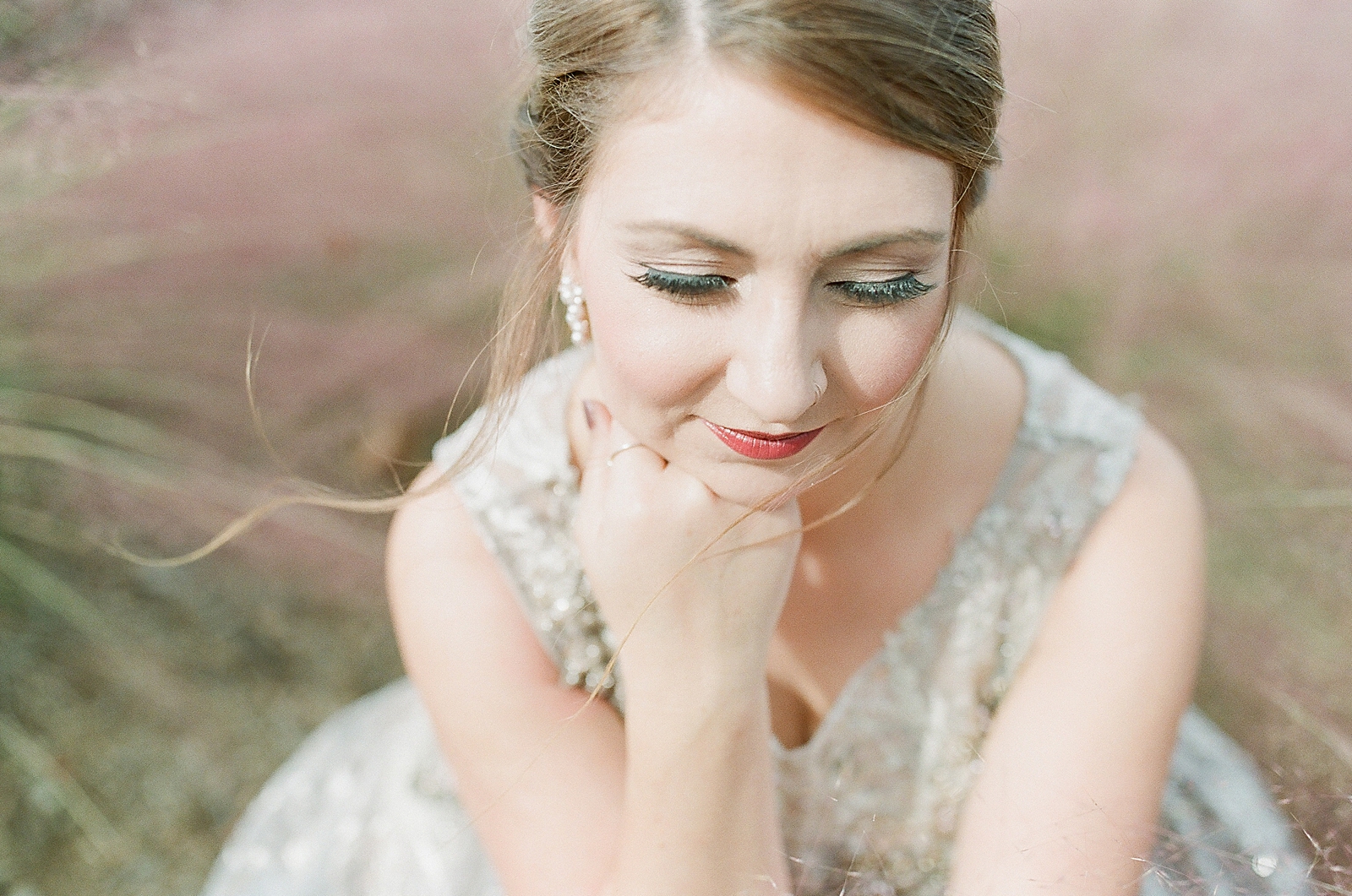 Asheville Bridal Editorial Bride with hand under chin looking down Photo
