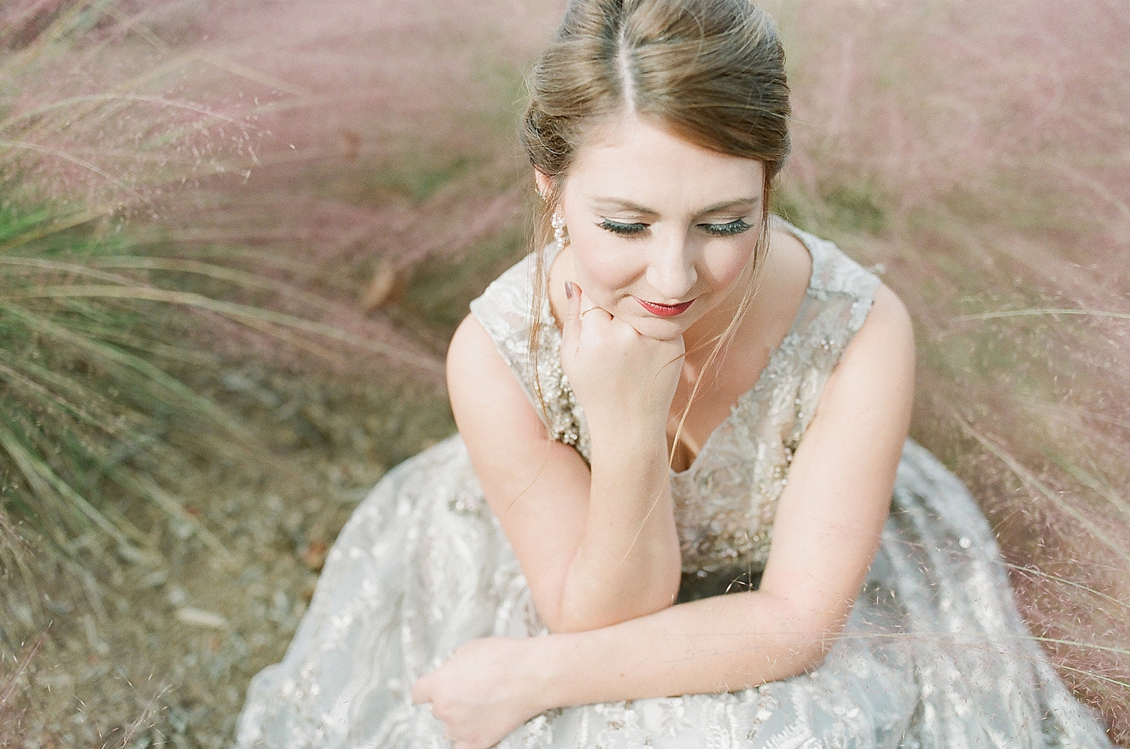Asheville Bridal Editorial Bride Looking Down with Hand Under Chin Photo