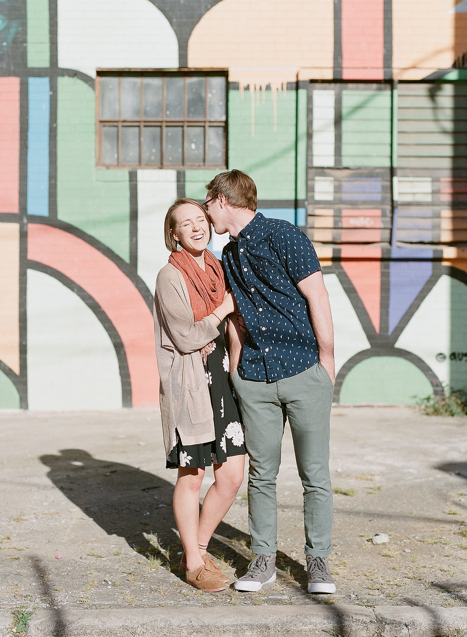 Downtown Asheville Engagement Session Couple Laughing and Hugging Photo