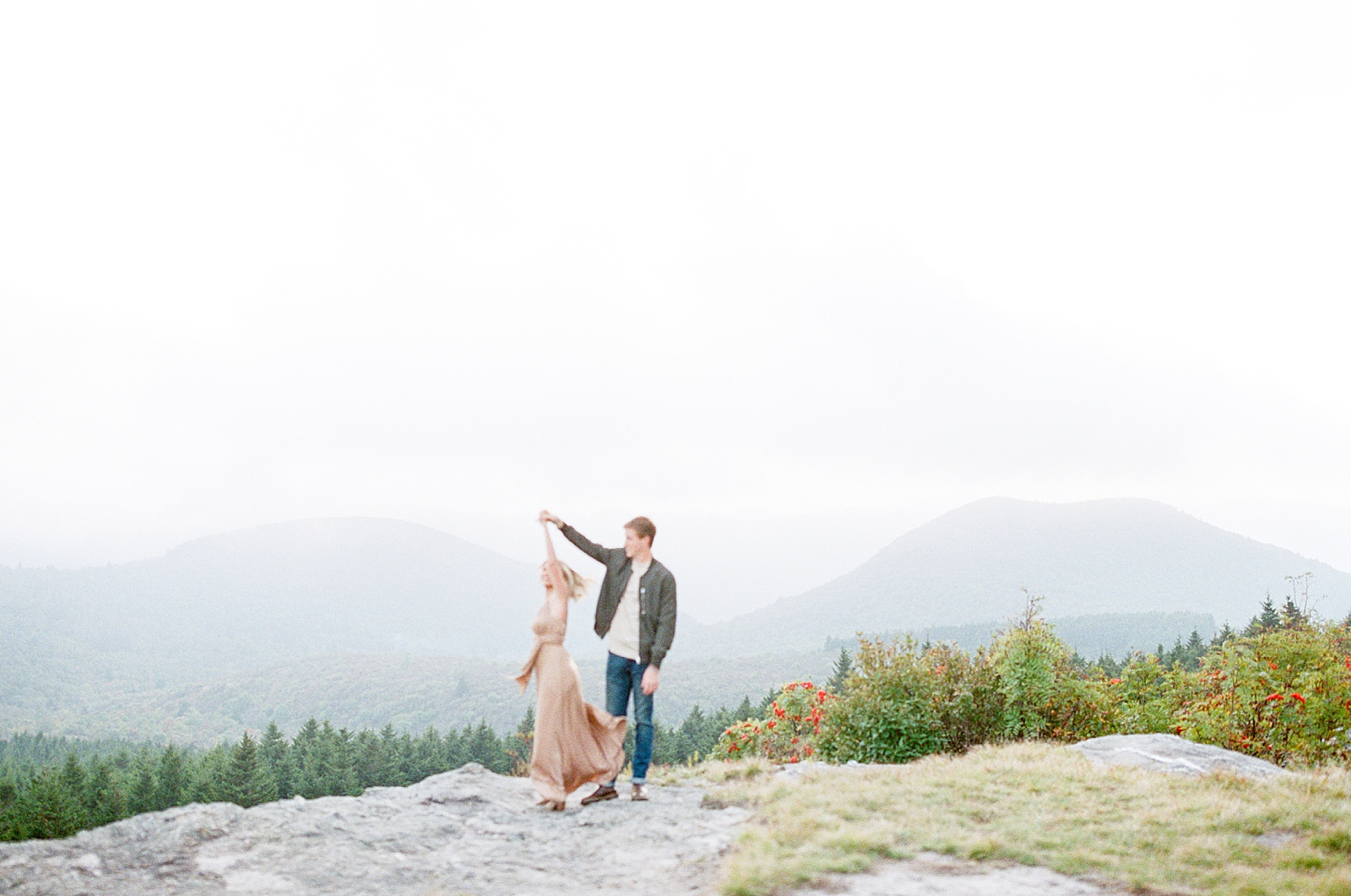 Asheville Mountaintop Session Couple Twirling Photo