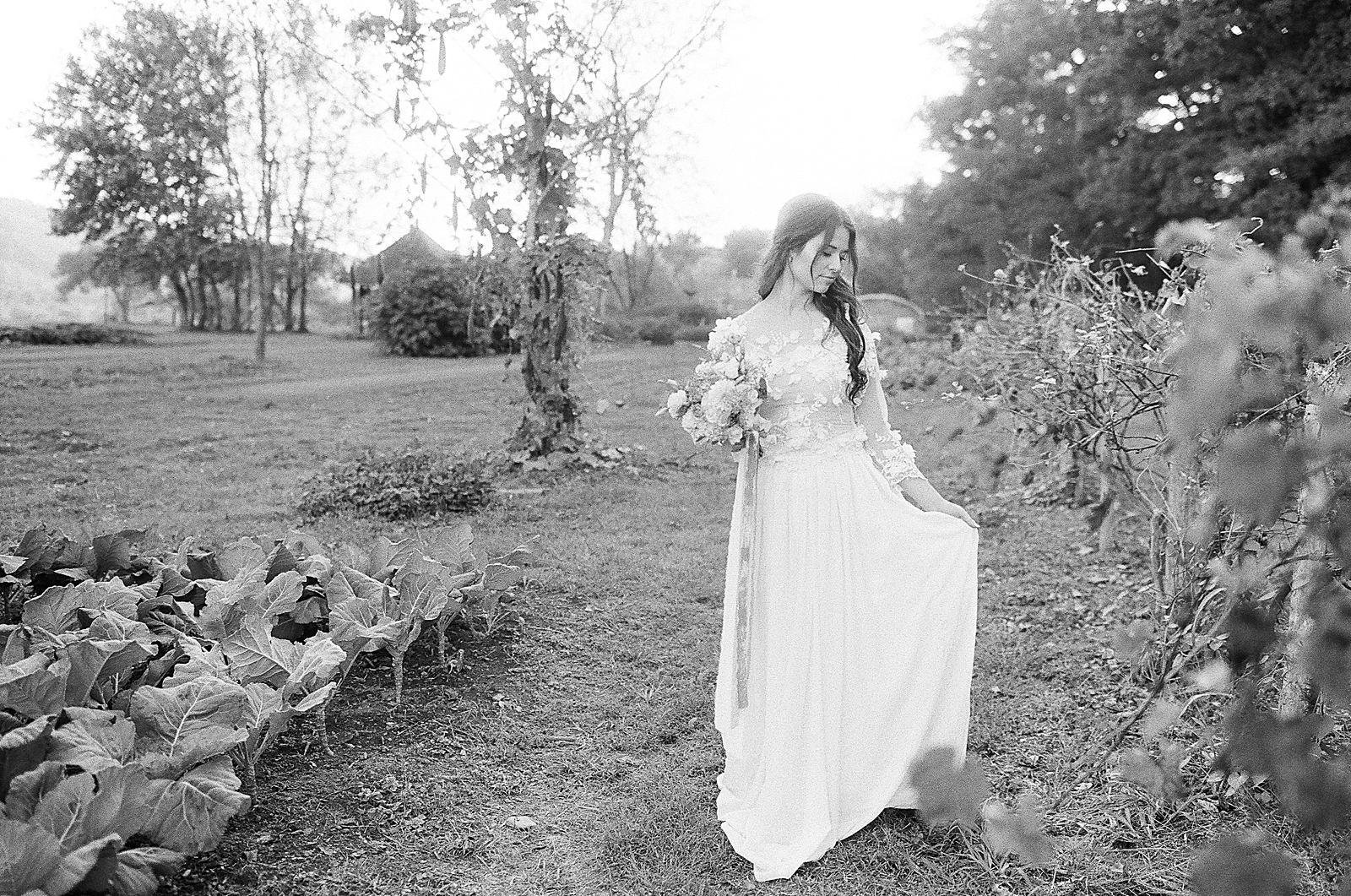 Asheville Wedding Photographer Bridal Editorial Black and White Bride Walking through Garden Photo