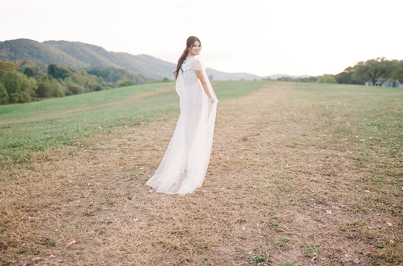 Asheville Wedding Photographer Bridal Editorial Bride Walking Away Looking Back over her shoulder Photo