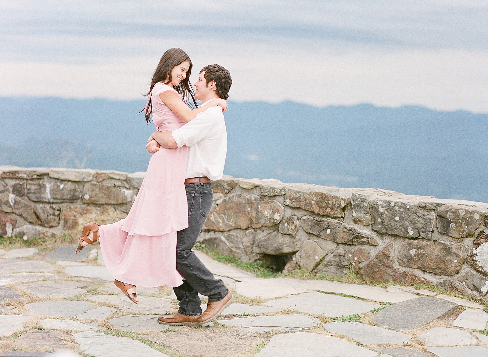 Mountaintop Engagement Ian Spinning Sierra in Pink Dress Photo 