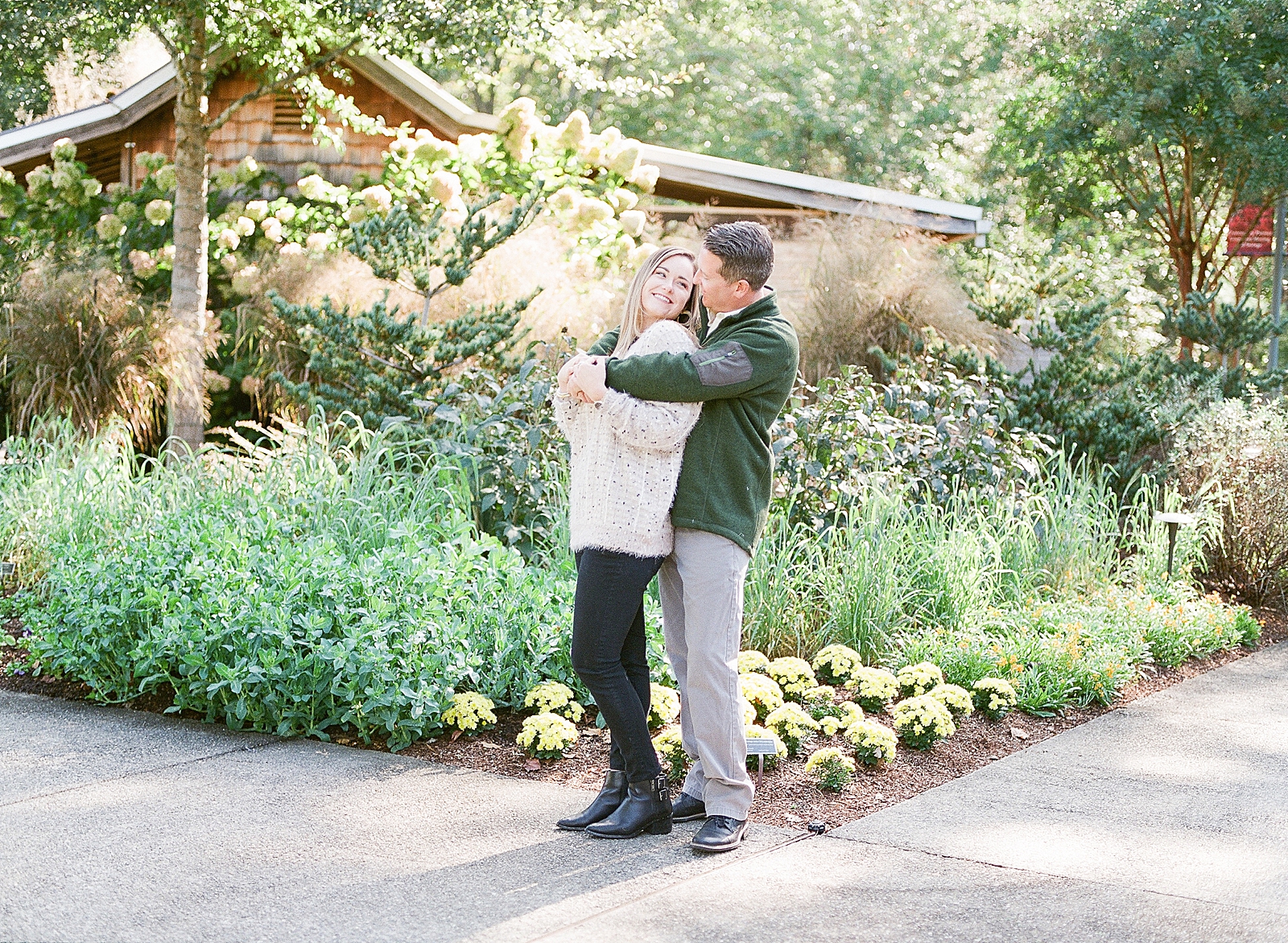 North Carolina Arboretum Couple hugging smiling at each other Photo