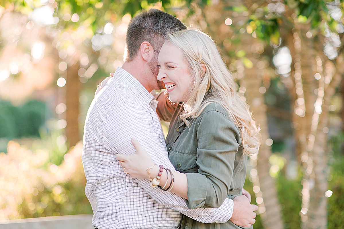 Asheville Arboretum Engagement Session Couple Laughing and Hugging Photo
