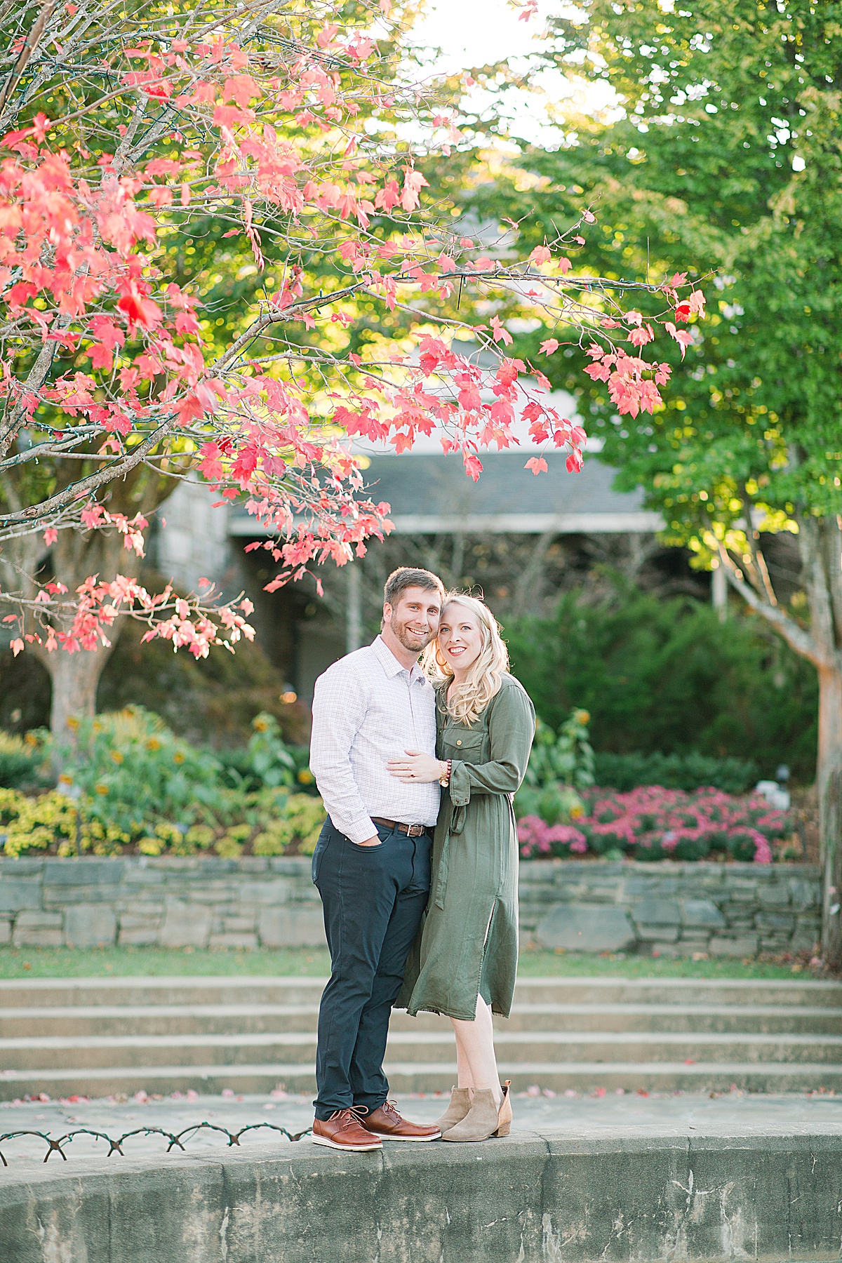 Asheville Arboretum Engagement Session Couple Smiling at Camera Under Red Tree Photo
