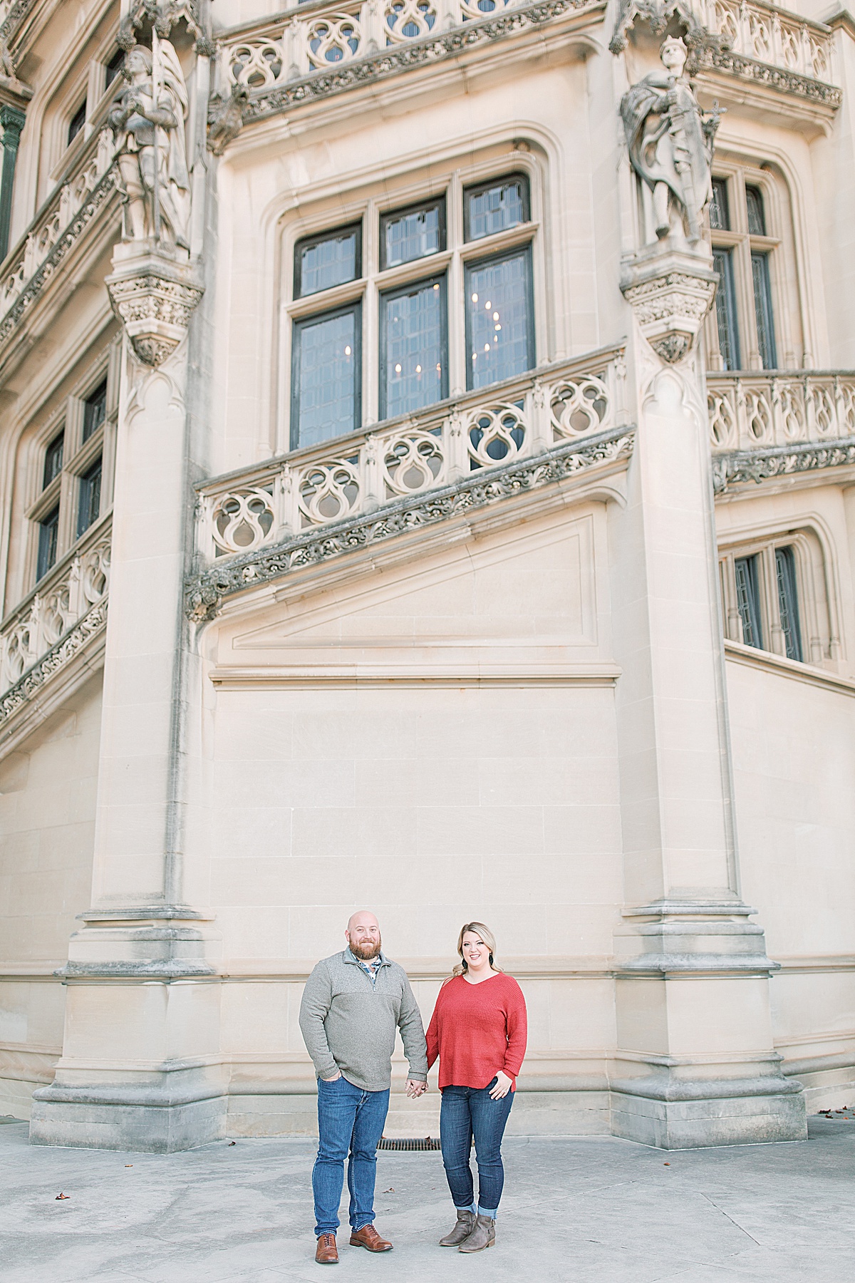 Biltmore Estate Engagement Session Couple Holding Hands Smiling at Camera Photo