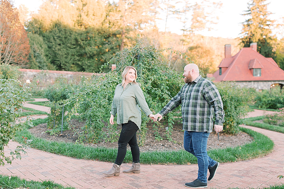 Biltmore Estate Engagement Session Couple Walking in Garden Photo