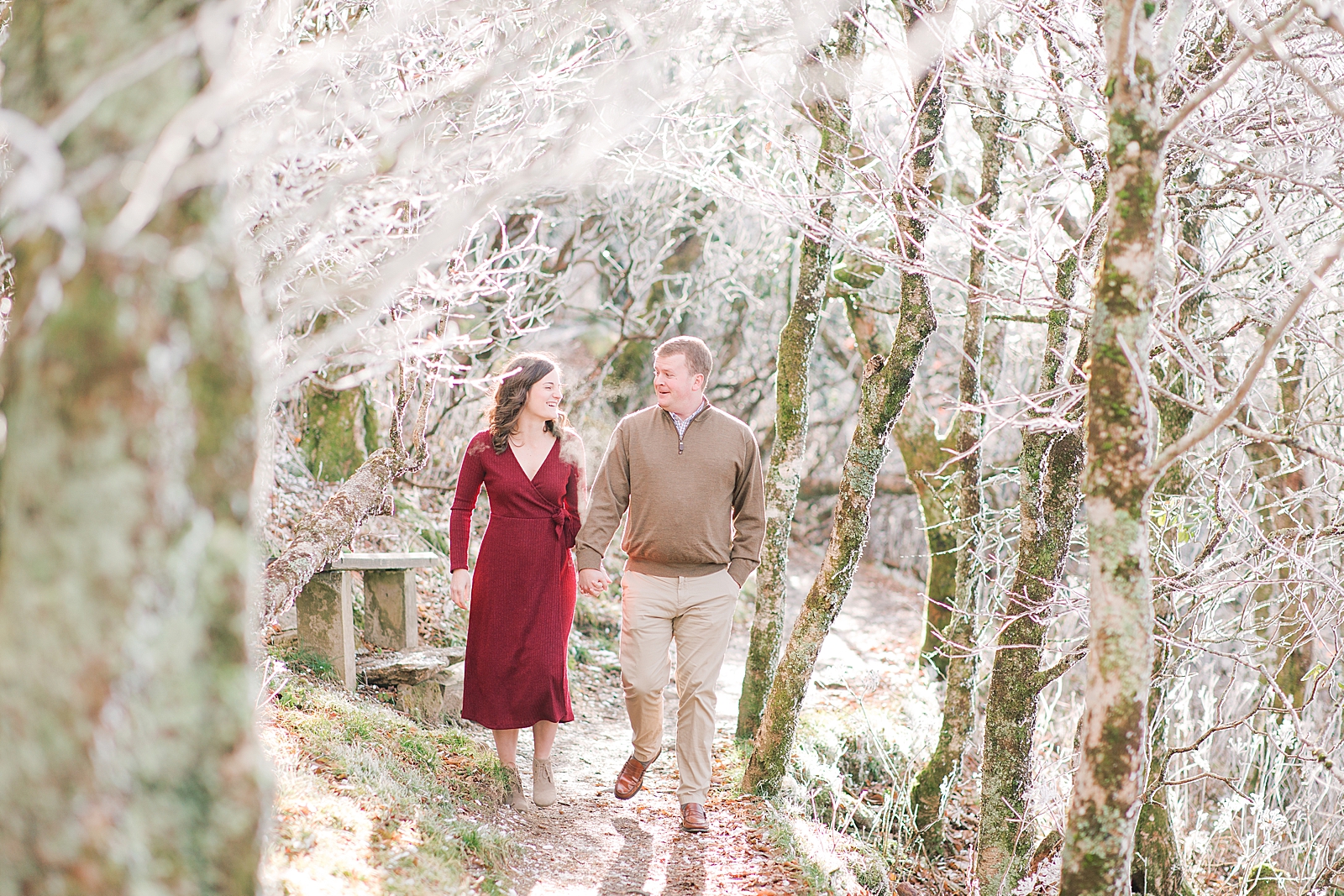Craggy Gardens Trail Engagement Session Couple Smiling at Each Other Walking toward Camera Photo