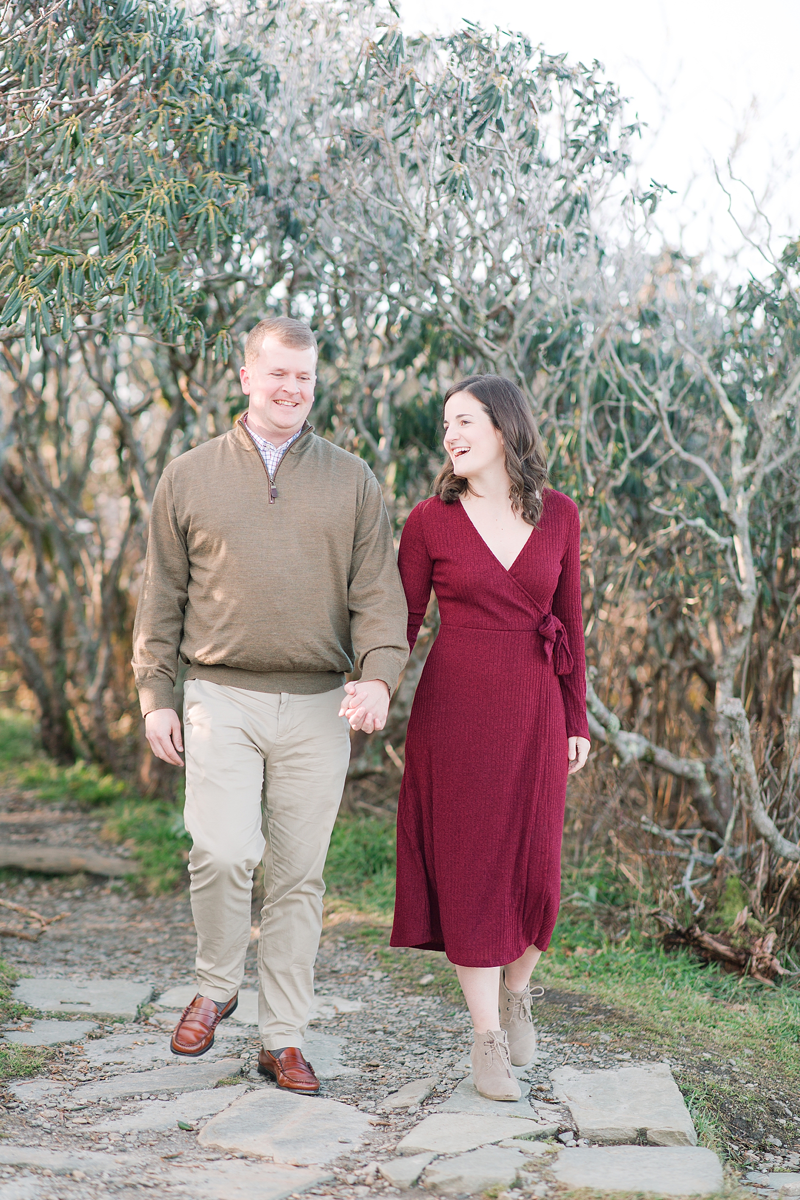 Craggy Gardens Trail Engagement Session Couple Walking and Laughing Photo