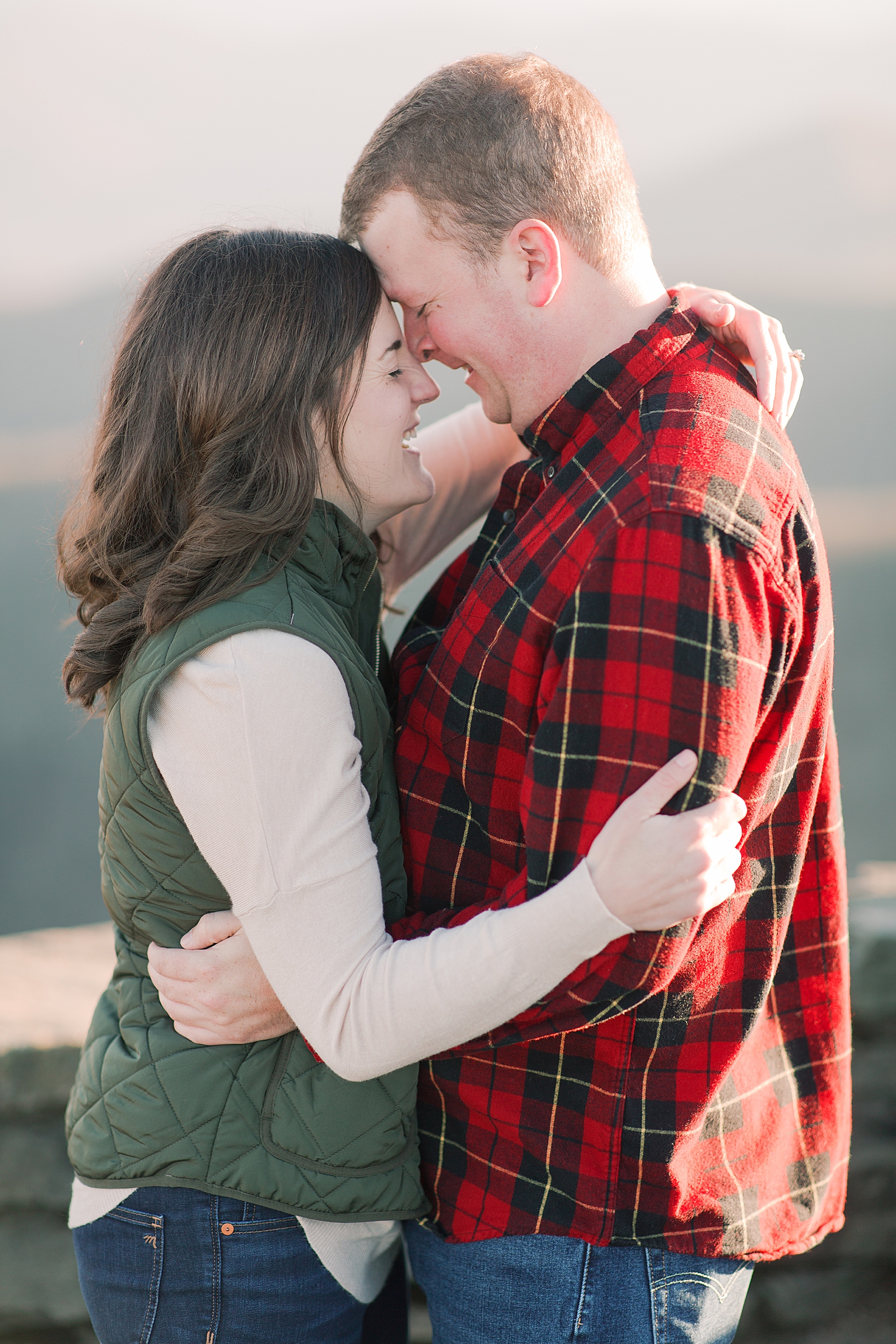 Craggy Gardens Trail Engagement Session Couple Laughing Nose to Nose Photo