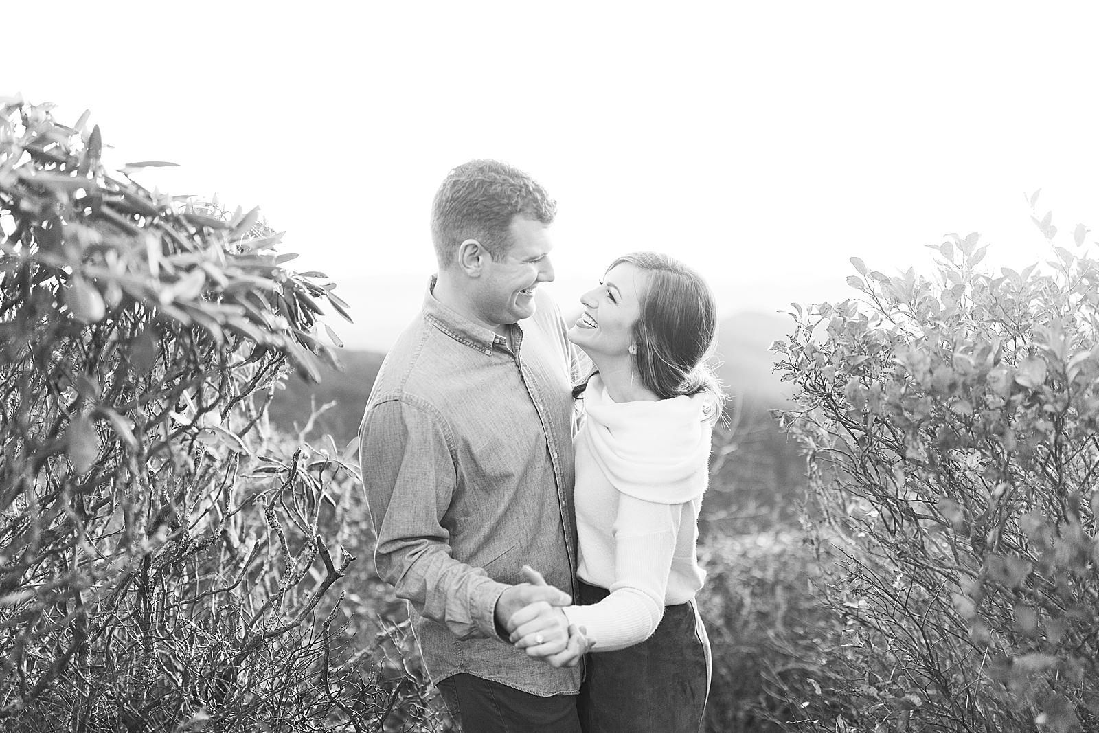 Craggy Gardens Engagement Black and White Of Couple Laughing Photo