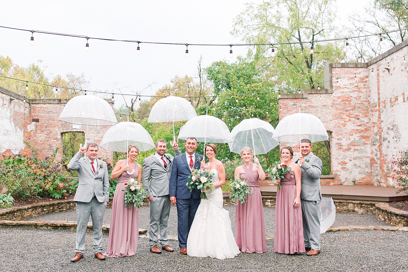The Hackney Warehouse Bridal Party with Clear Umbrellas Photo
