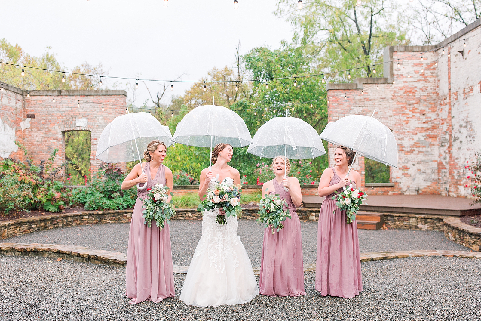 The Hackney Warehouse Bride Laughing with Bridesmaids in the Rain Photo