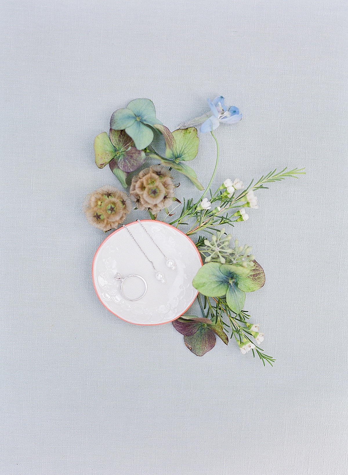 Ring Dish with Earrings, Ring and Flowers Photo