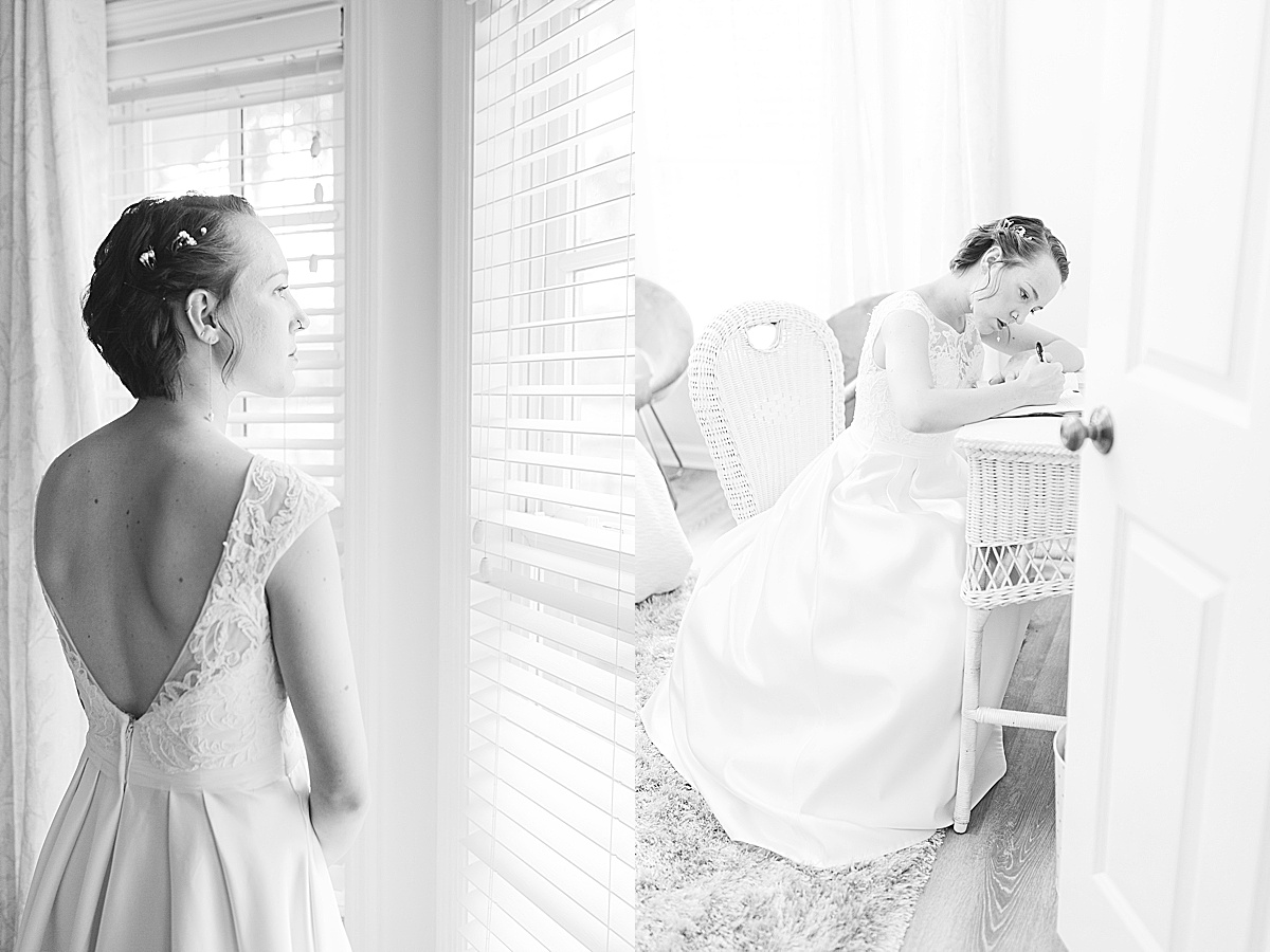Hewitt Oaks Bride looking out window and writing vows Black and White Photos 