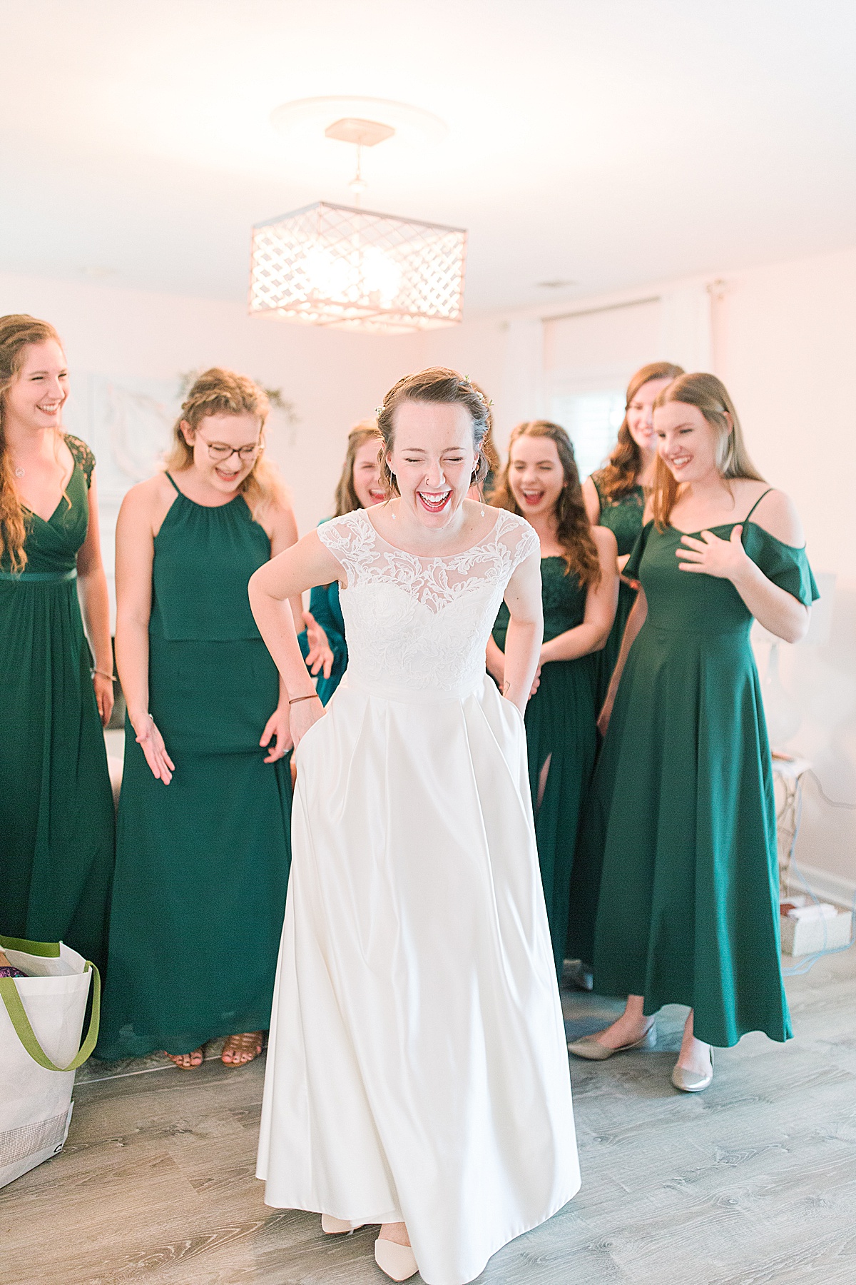 Bride Spinning around Laughing with Bridesmaids Photo 