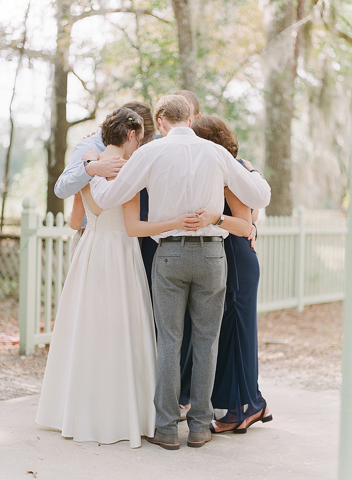 Bride Praying with Her family at Hewitt Oaks Photo 