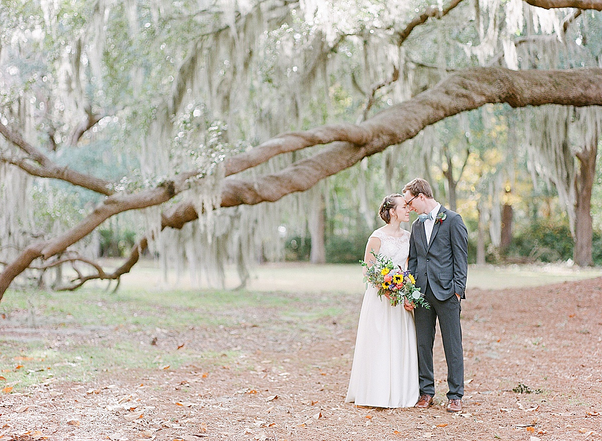 Hayley and Michael Nose to Nose Under Big Oak Tree Photo 