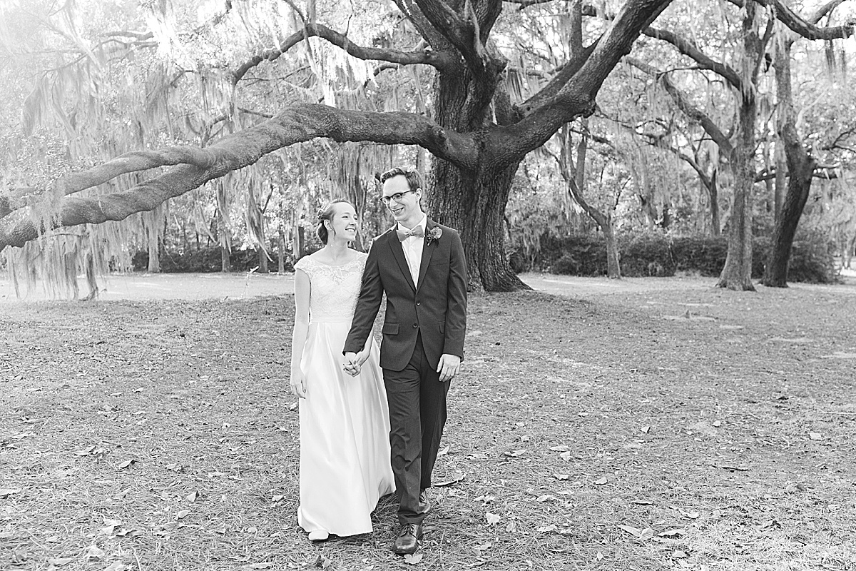 Black and White Of Hewitt Oaks Couple Holding Hands Walking Toward Camera Photo 