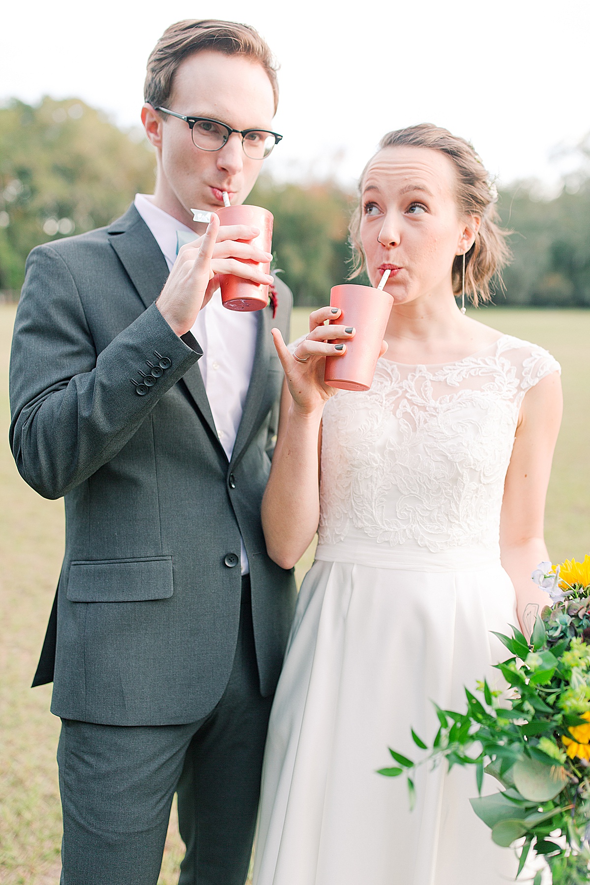 Bride and Groom Drinking from Copper Cups 
