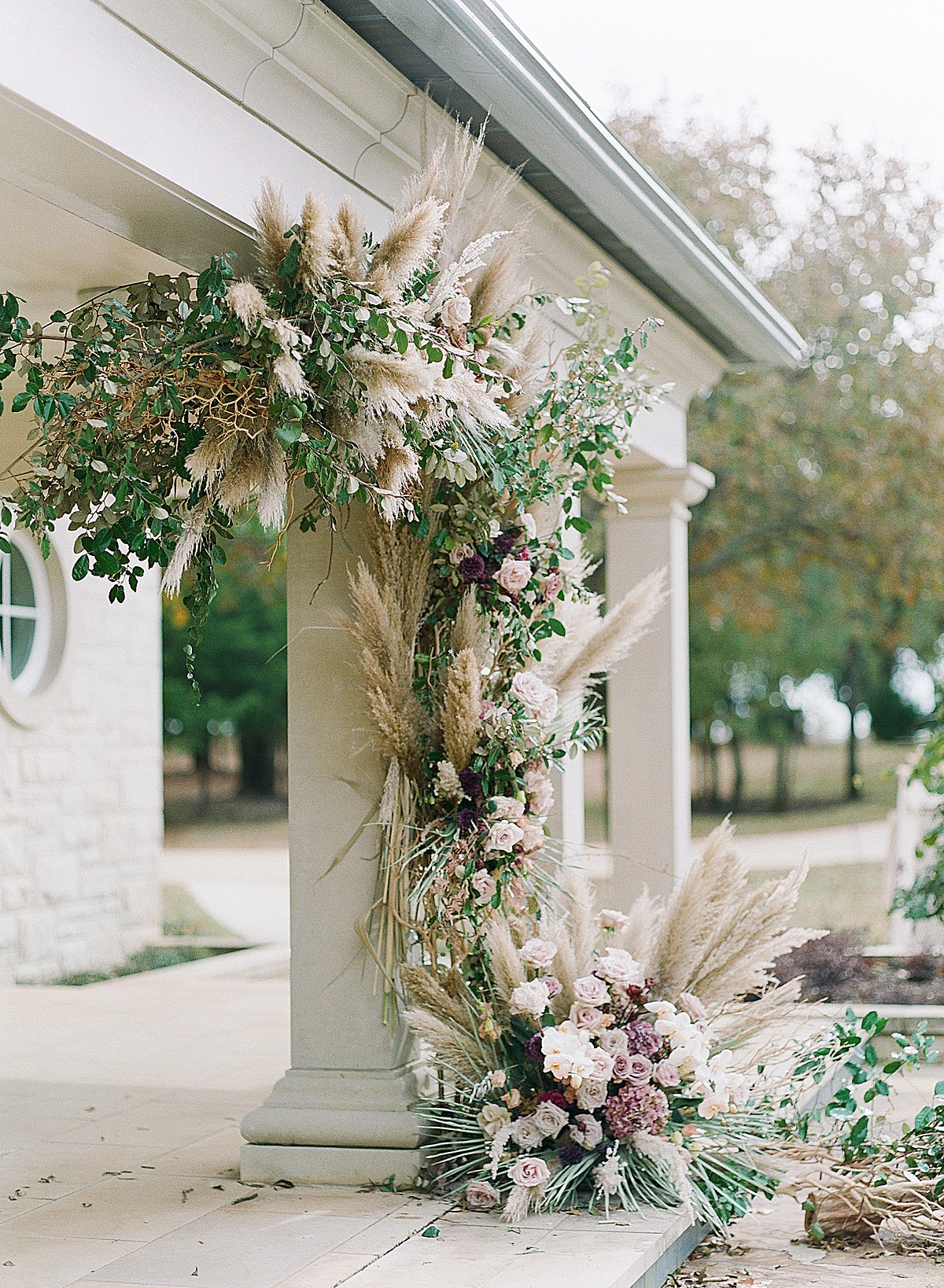 Wedding Ceremony floral installation with pampas grass and lavender florals Photo