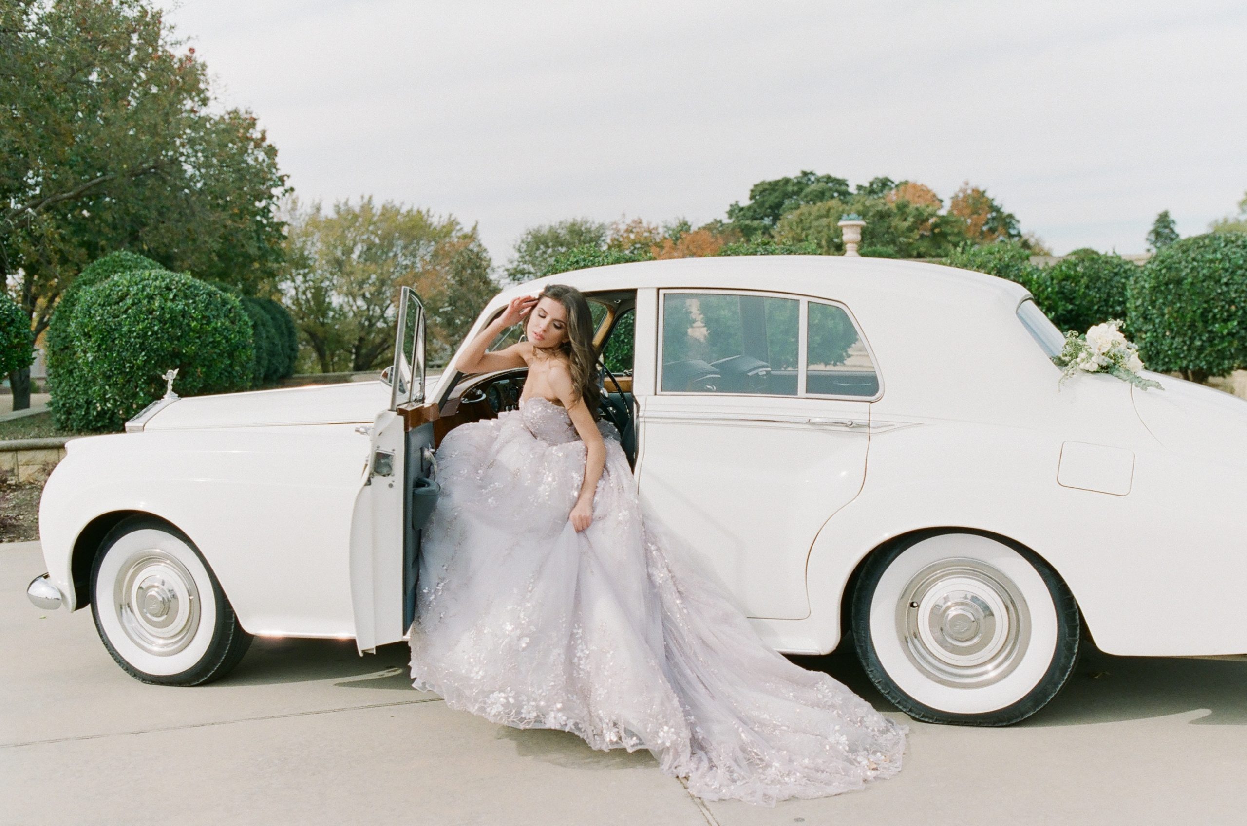 Couture Wedding Dresses Editorial Bride in Sparkling Lavender Gown in White Vintage Car 