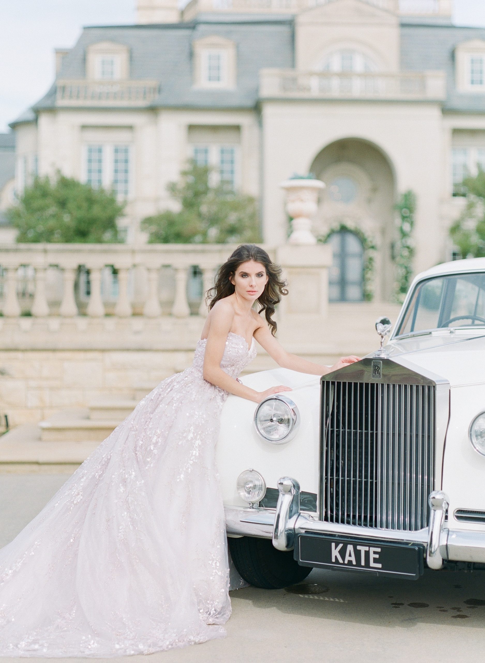 Bride Leaning on Vintage Rolls Royce 