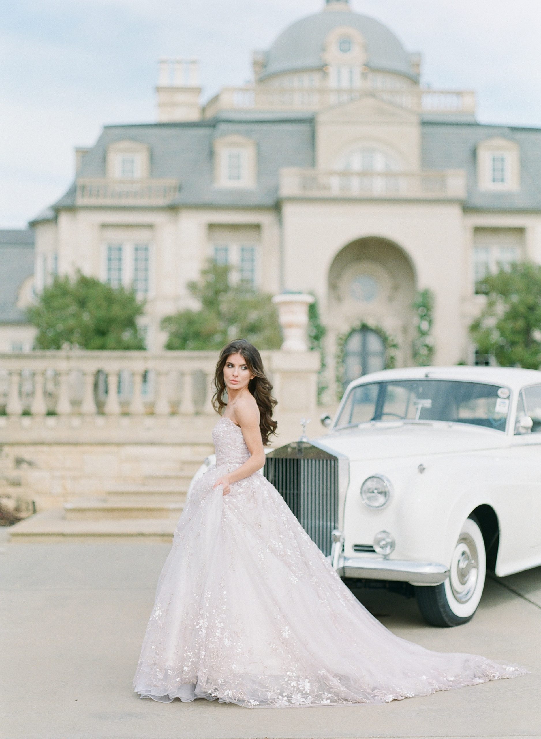 Bride in Front of Rolls Royce in Couture Wedding Dresses