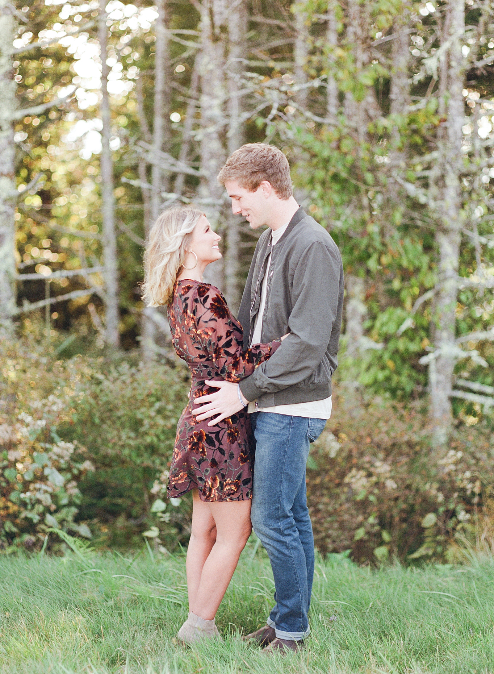 How To Have The Best Engagement Photos Couple Hugging Smiling At Each Other Photo