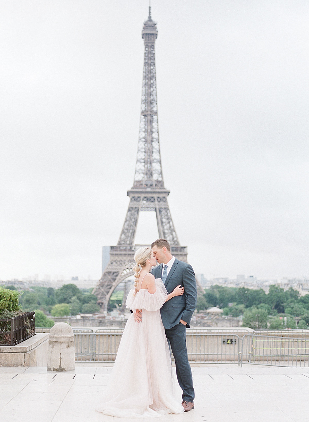 Eiffel Tower Wedding Bride and Groom Kissing and Hugging Photo