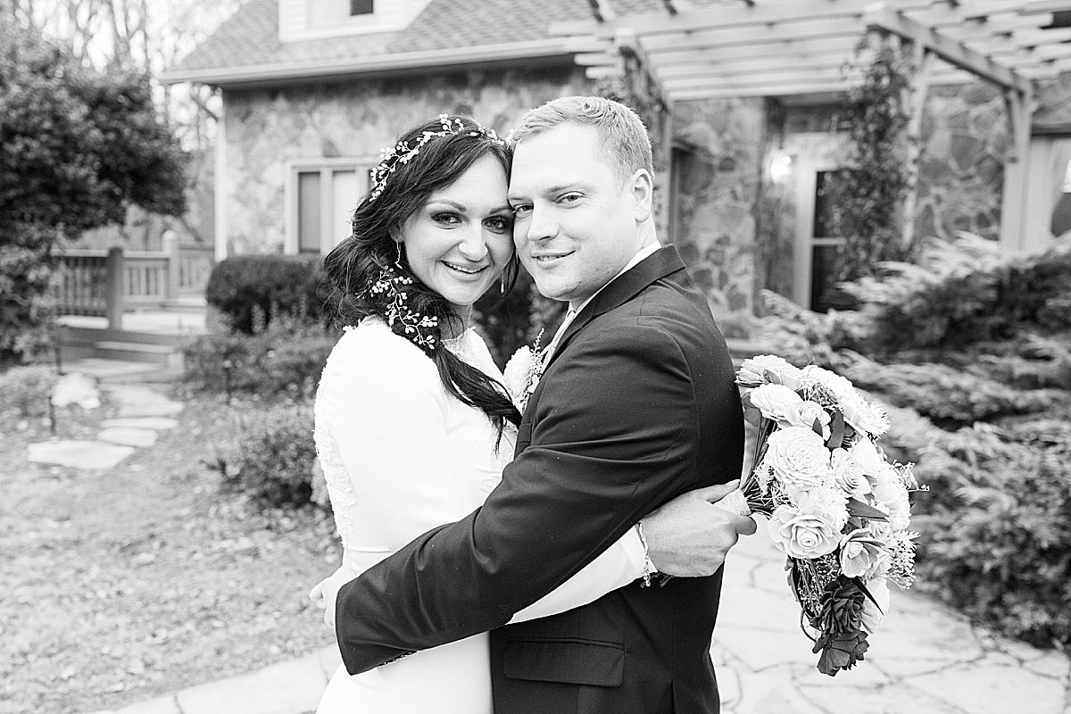 Black and White of Bride and Groom Smiling at Camera Photo