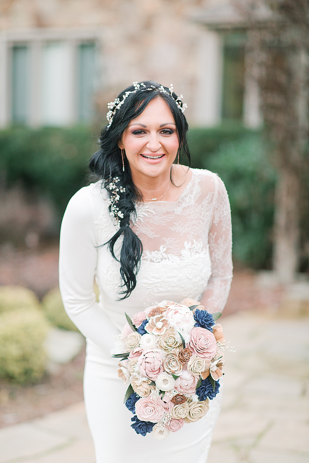 Bride Laughing at Camera Holding Bouquet Photo