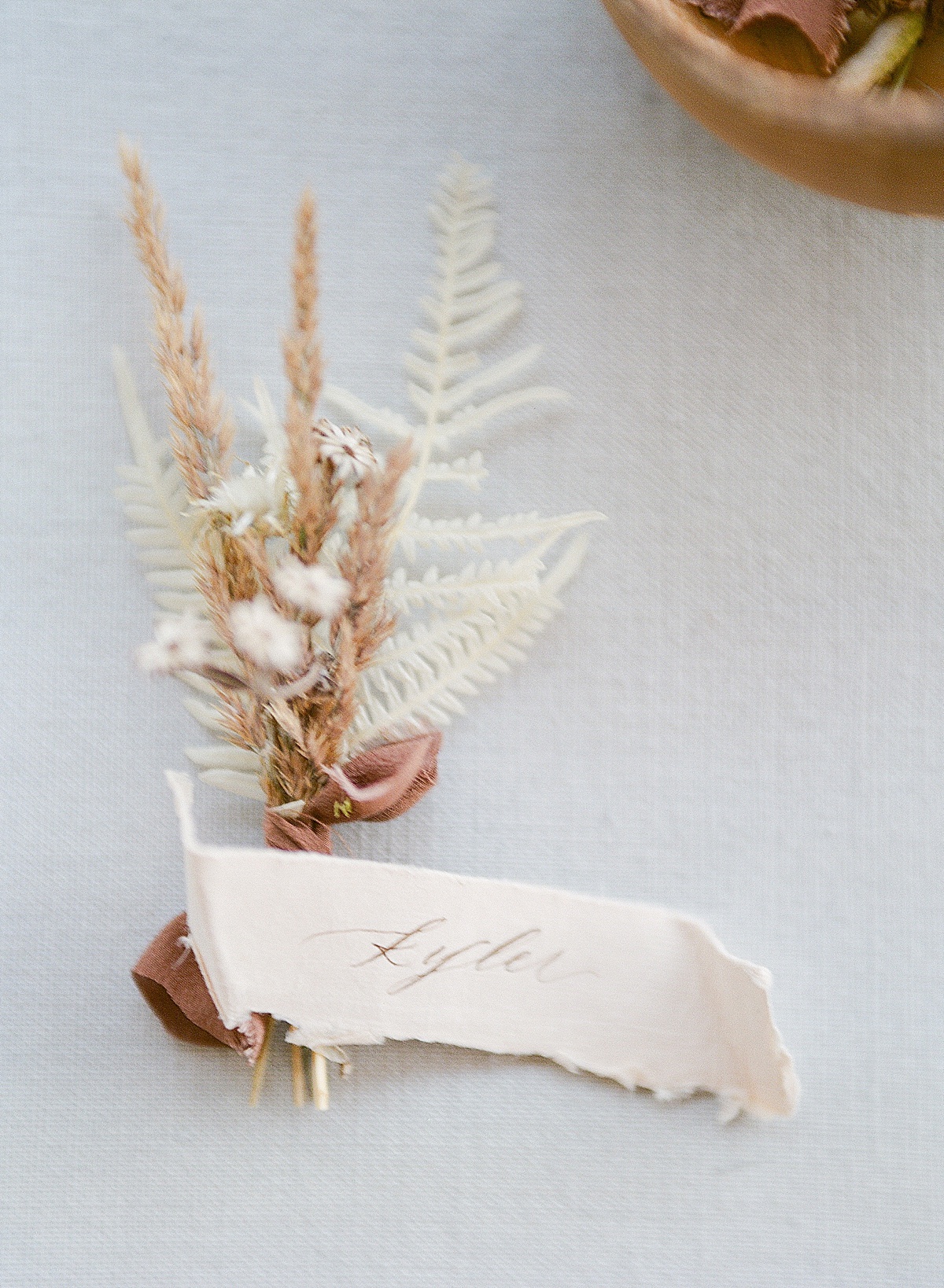 Fine Art Wedding Detail Of Name Tag With Dried Flowers Photo