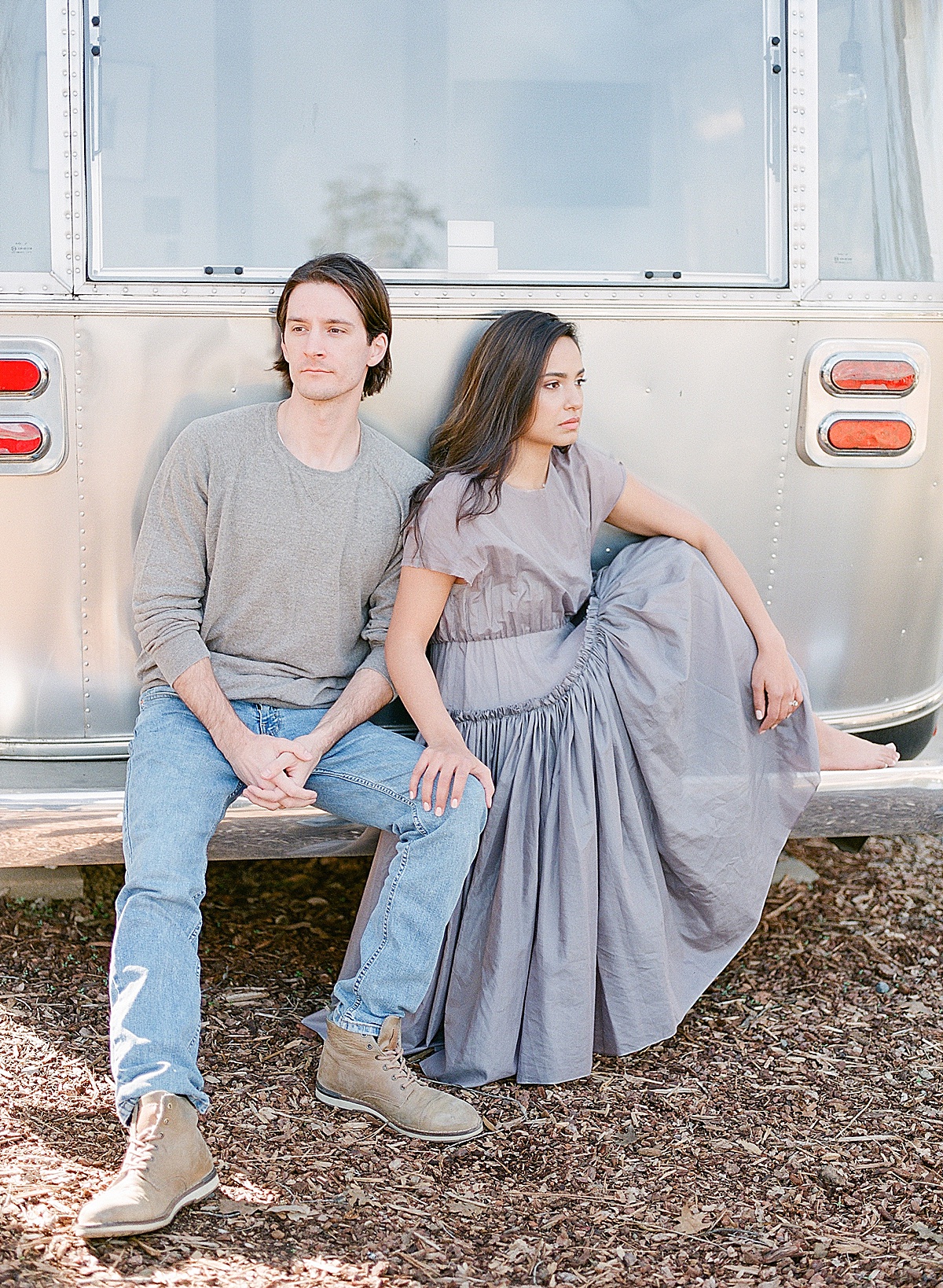 Autocamp Yosemite Couple Sitting On Airstream Bumper Photo 