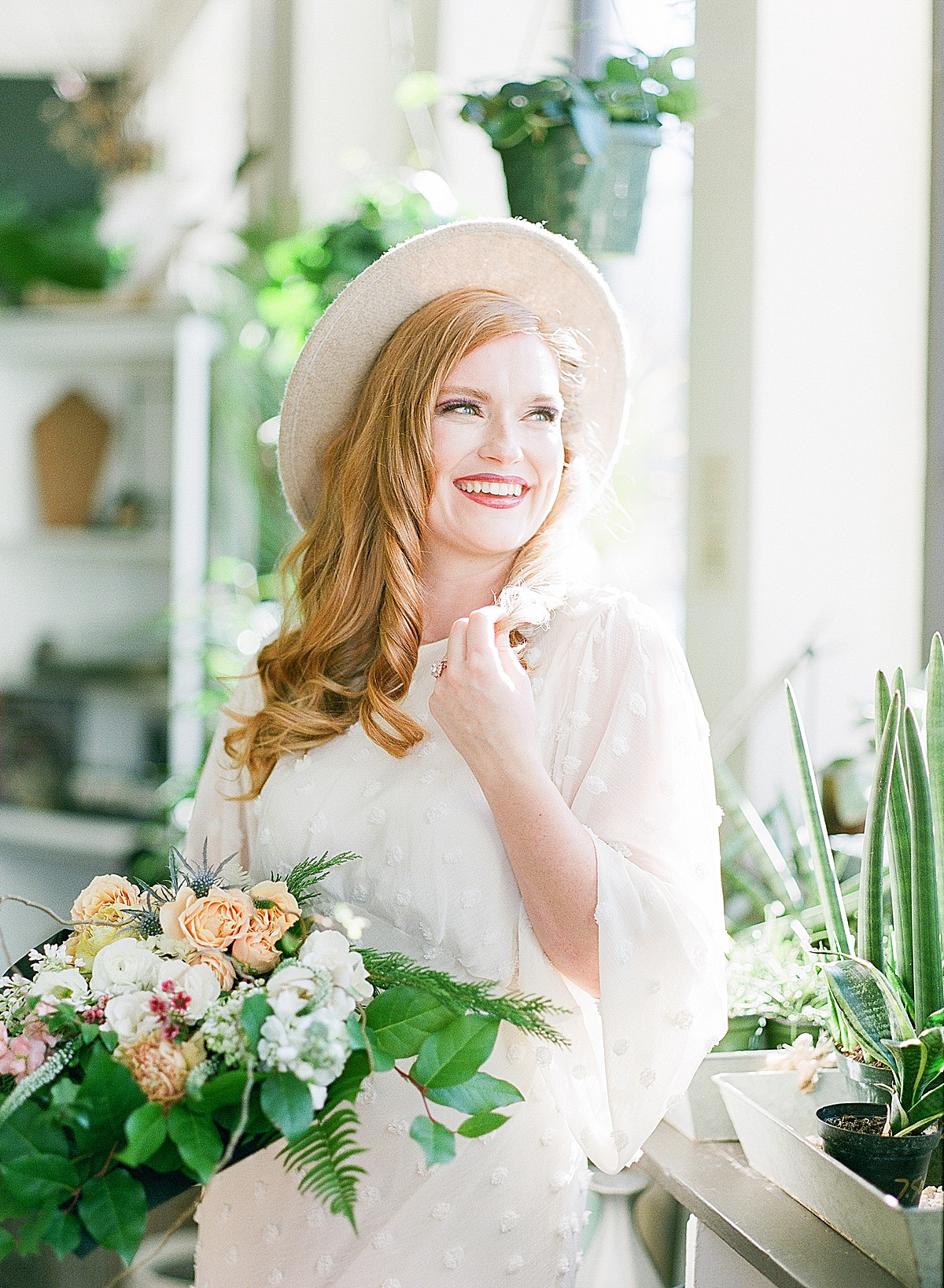 Model in Flower Shop Holding Bouquet Laughing Over Shoulder Photo 
