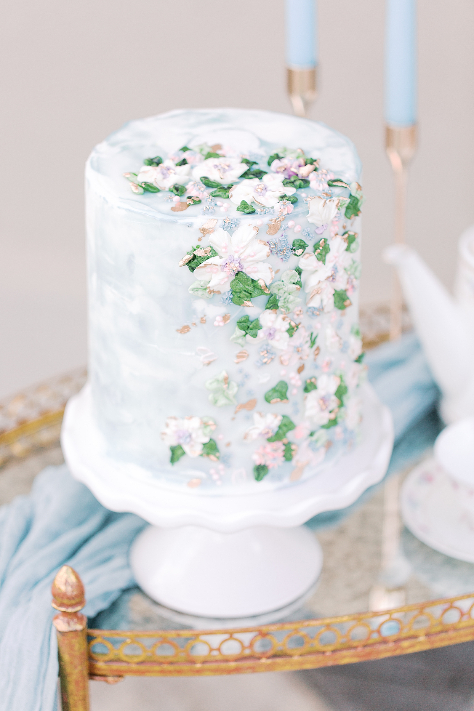 Small Light Blue Cake With Buttercream Flowers Photo