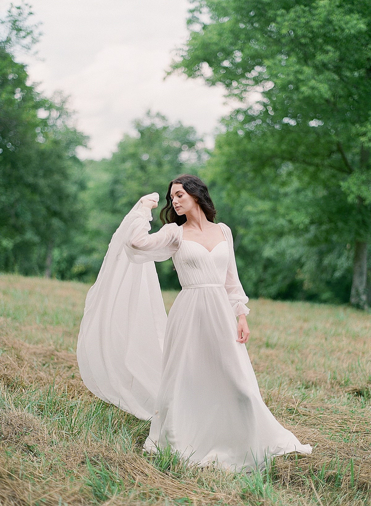 Romantic Bridal portrait of Bride in Field Photo