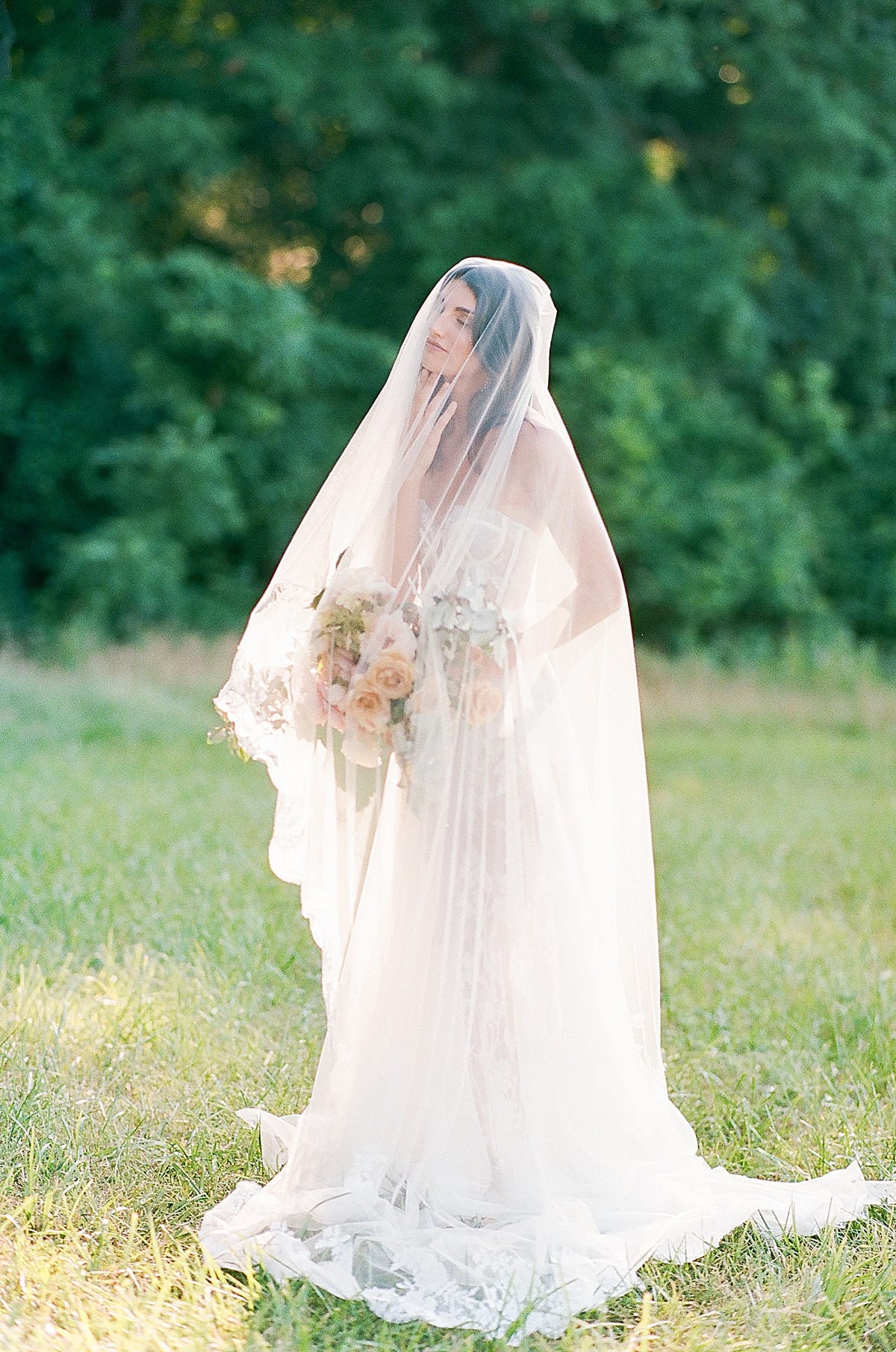 Bride in Alon Livne White Gown with Veil Photo 