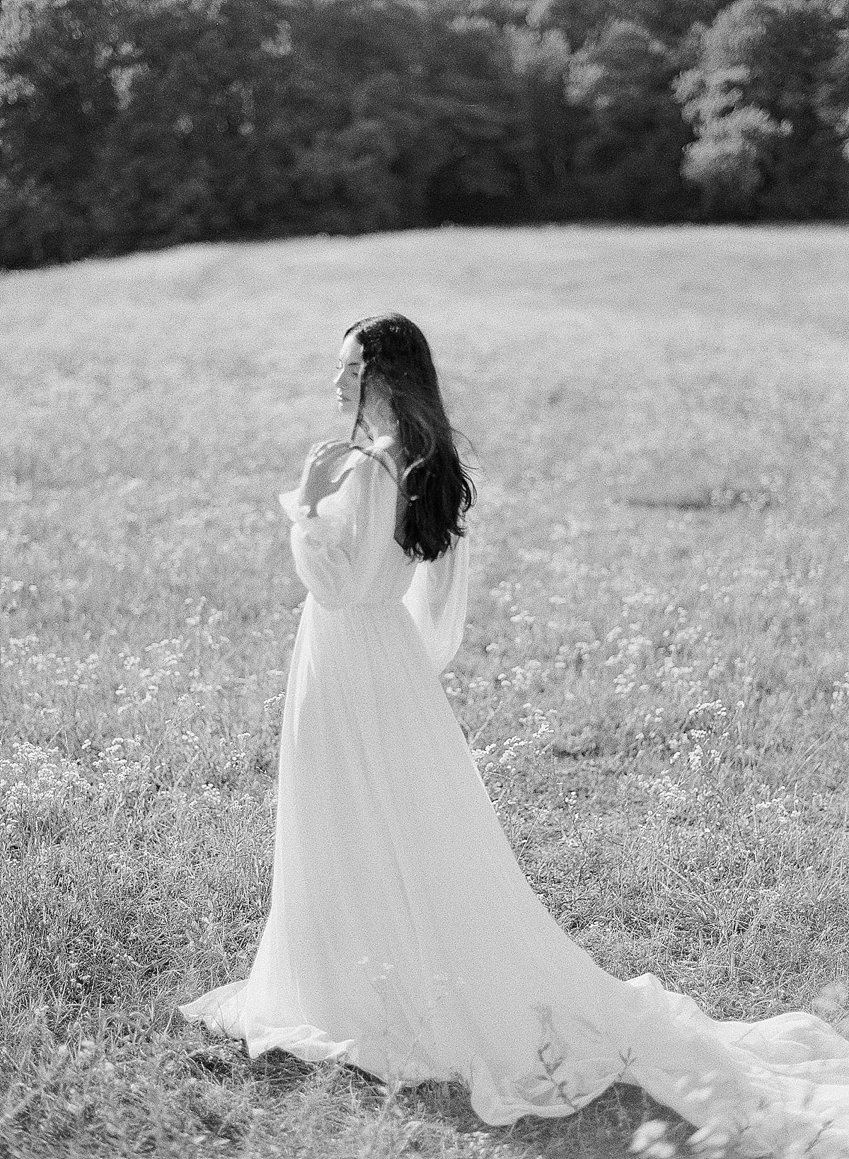Black and White of Bride in field photo